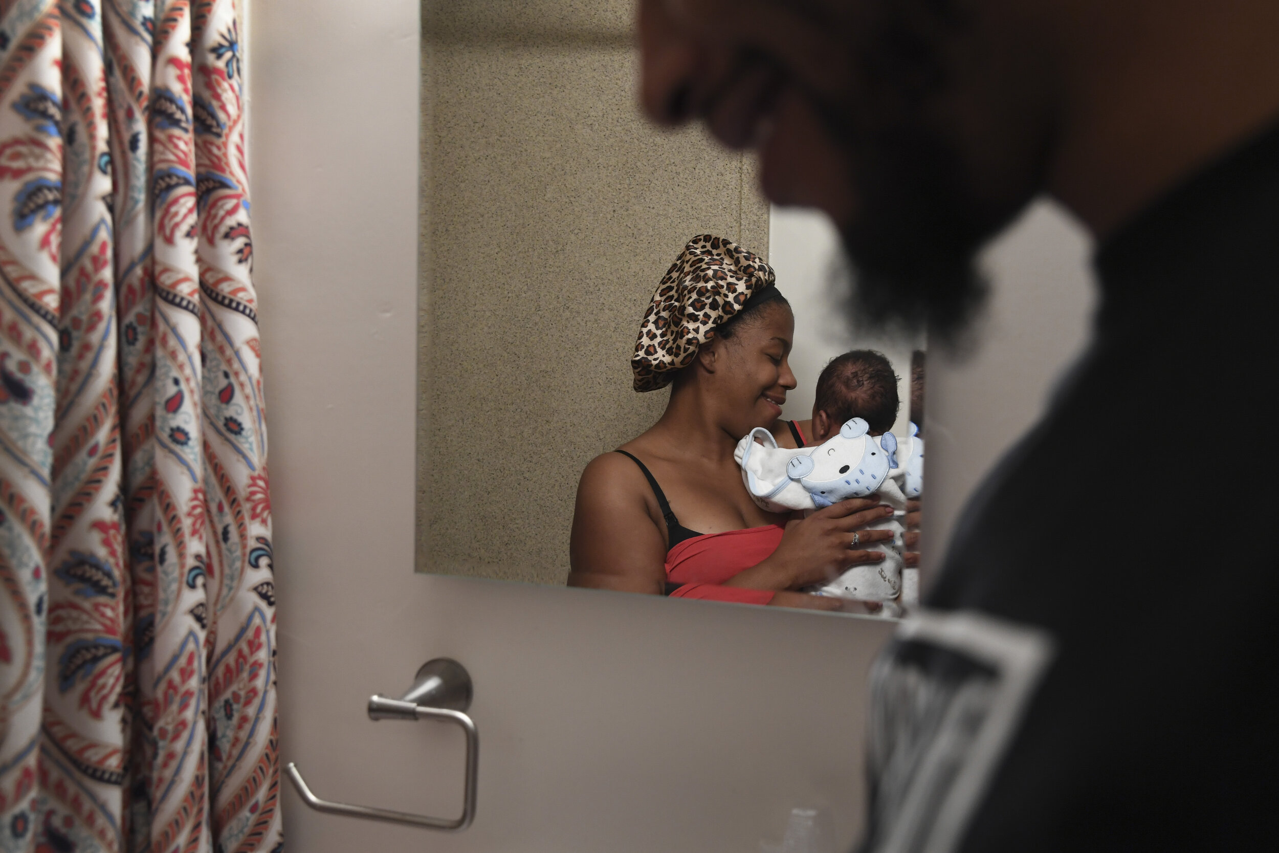  Denis Avery smiles at his girlfriend Adrian Davis and their six-week-old son Cyrus Davis after bath time at their apartment in Monticello, Ny., Oct. 13th, 2019. Davis, who takes classes through the Sullivan County Breastfeeding Coalition, says breas