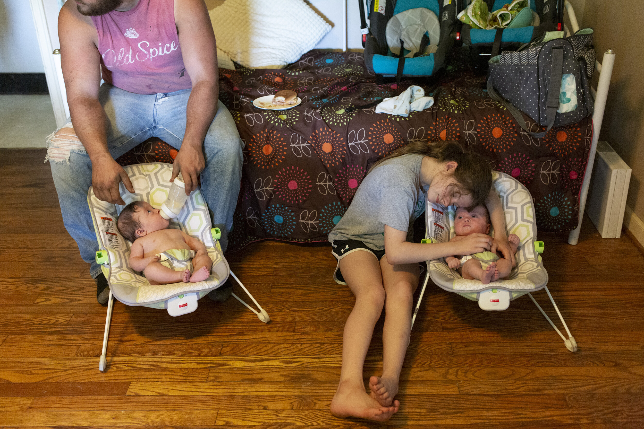  Lizzy Gilchrist, 10, of Sharpsburg, Ohio helps her neighbors care for their twin babies, Eli and Evan Hammer ,4 months, who were recently brought home from the NICU, May 5, 2019.  