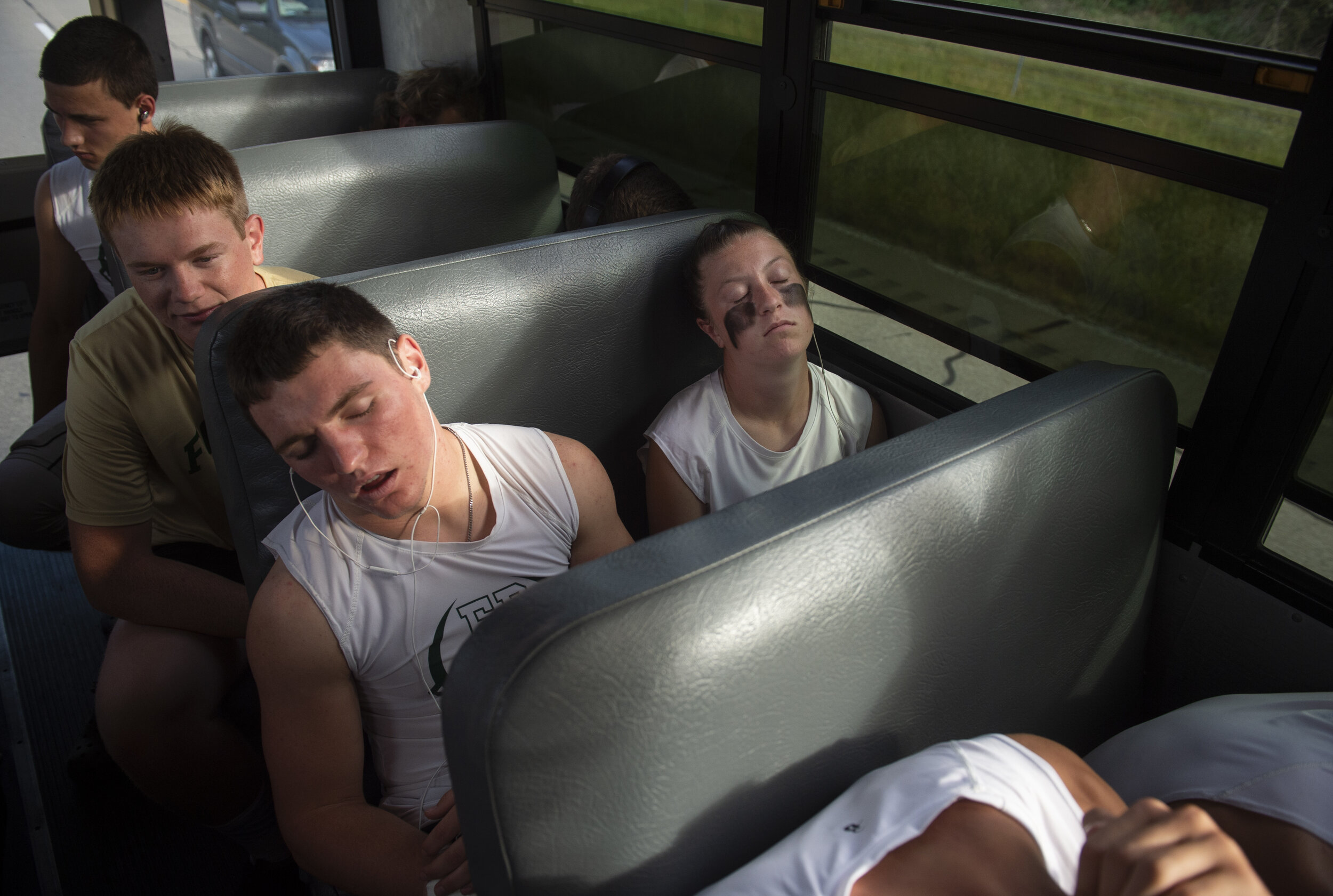  Forest Park Seniors Gavin Knust, left, and Abby Eckert, right, rest up on the way to a football game at North Posey High School in Poseyville, Ind., Friday, Sept. 27, 2019. "I just see myself as one of the guys out there," said Eckert, the third fem