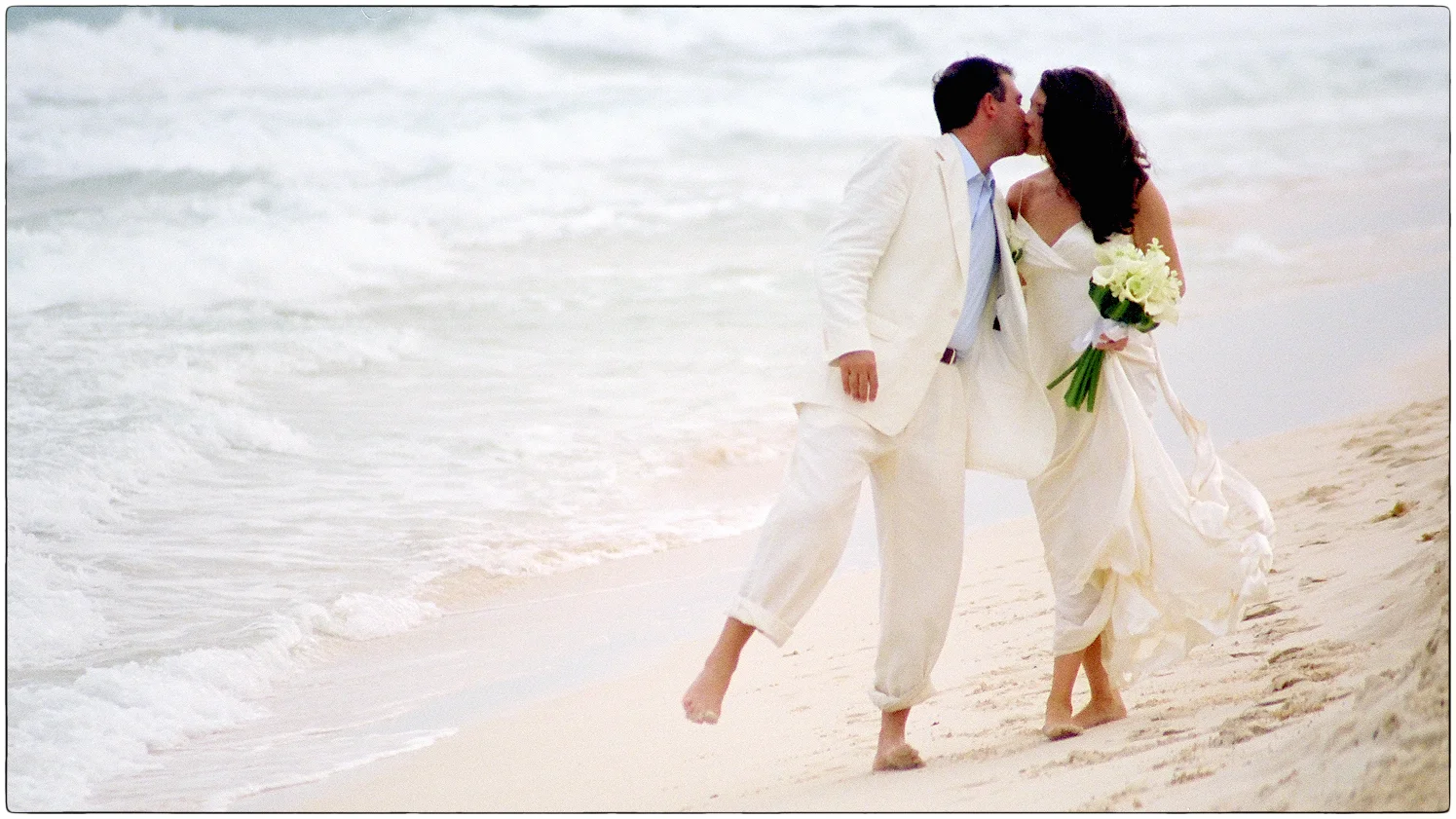 Wedding kiss on the beach
