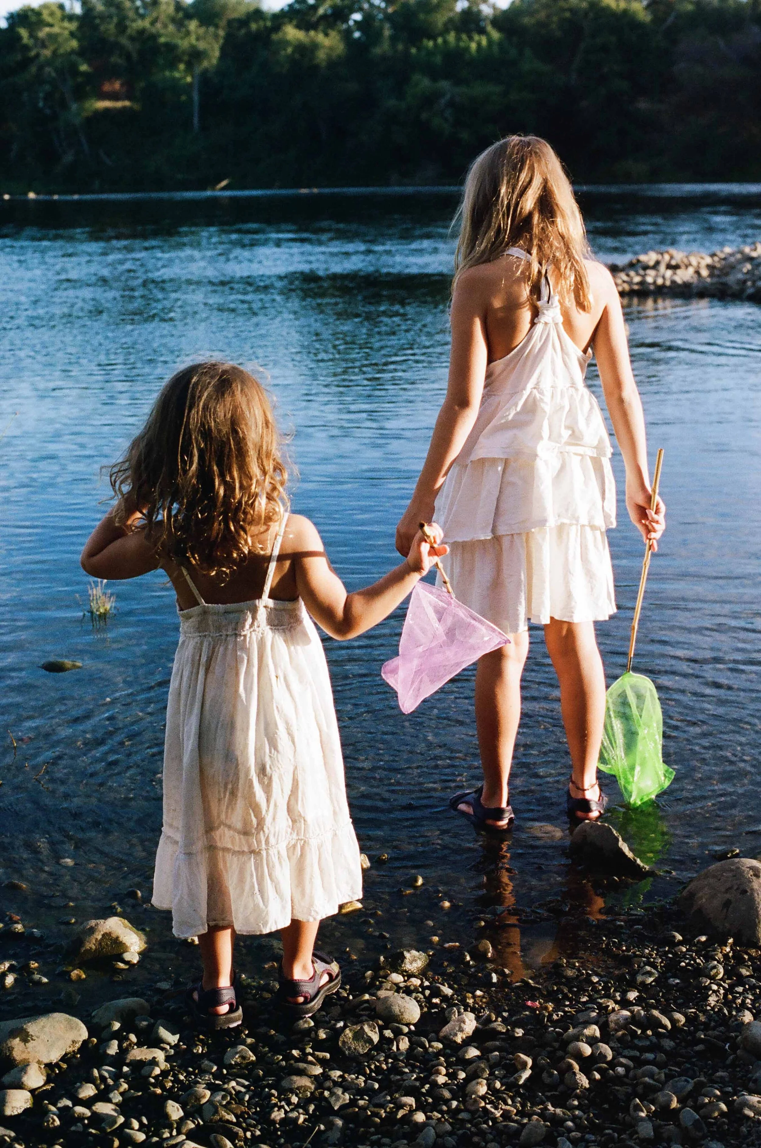 young sisters fishing in the american river.jpg