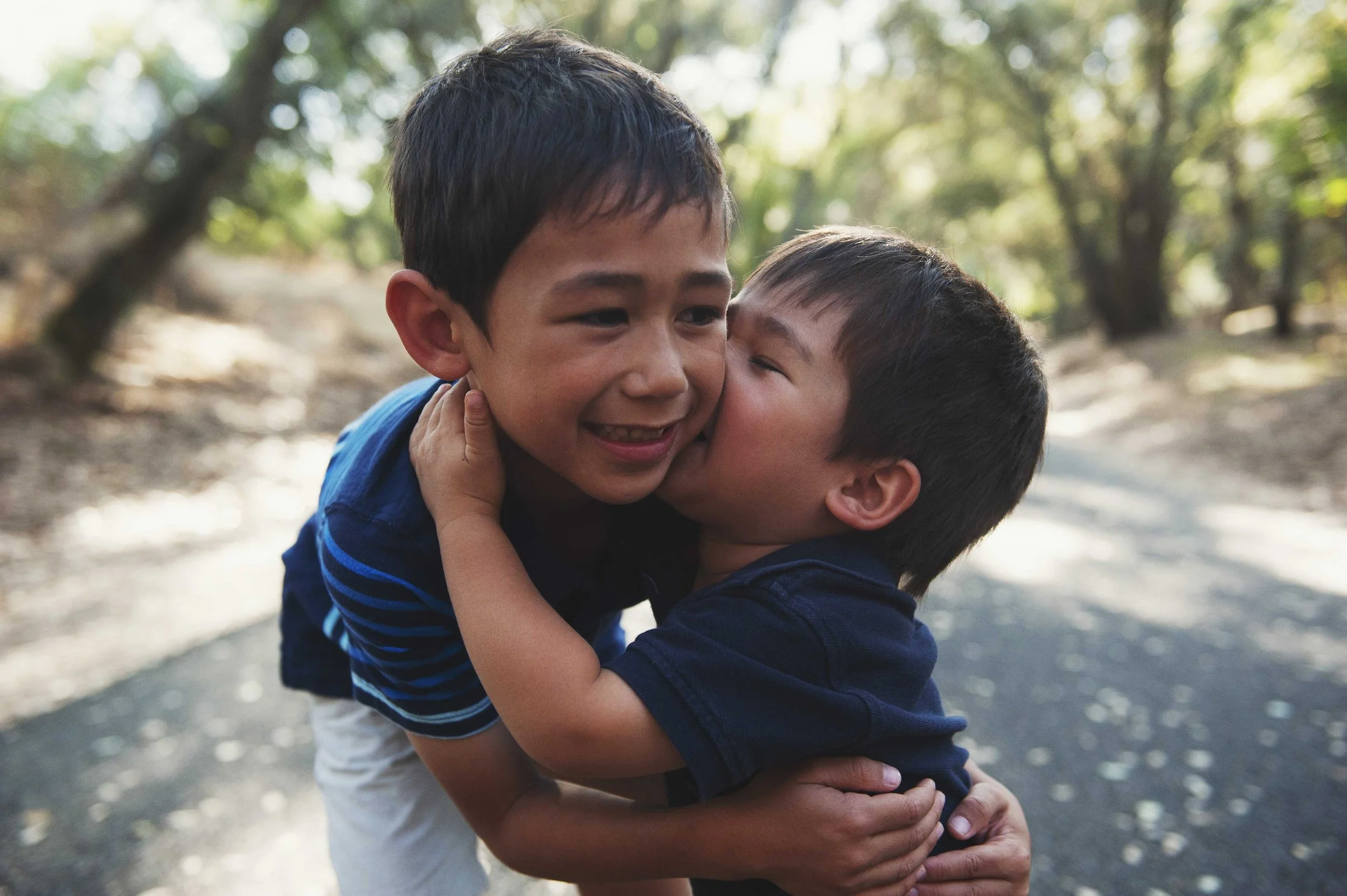 little boys kissing american river parkway.jpg