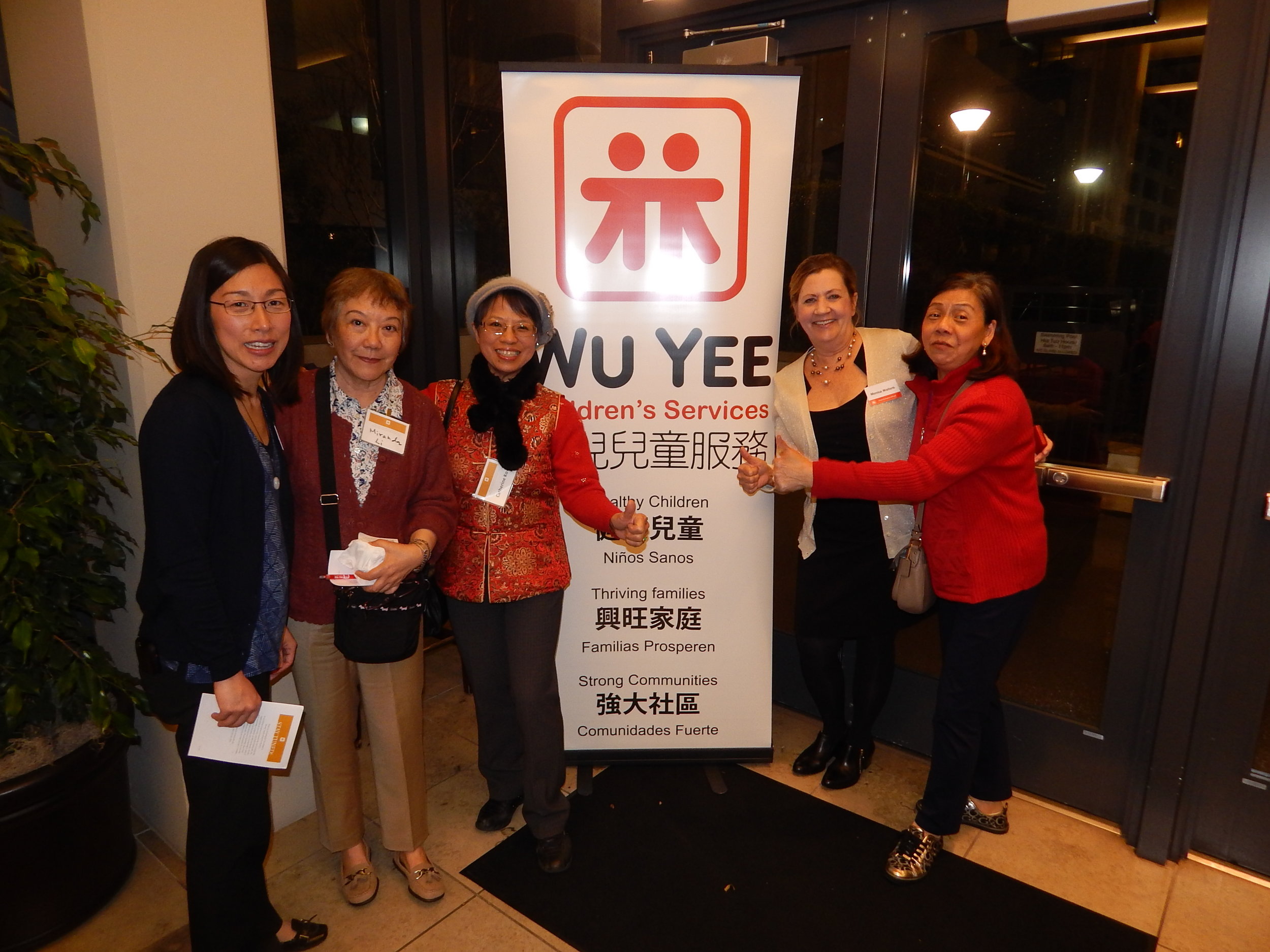 Wu Yee's Chief Programs Officer, Alyson Suzuki, and CEO, Monica Walters with some of the agency's founders the 2016 Board Reunion.