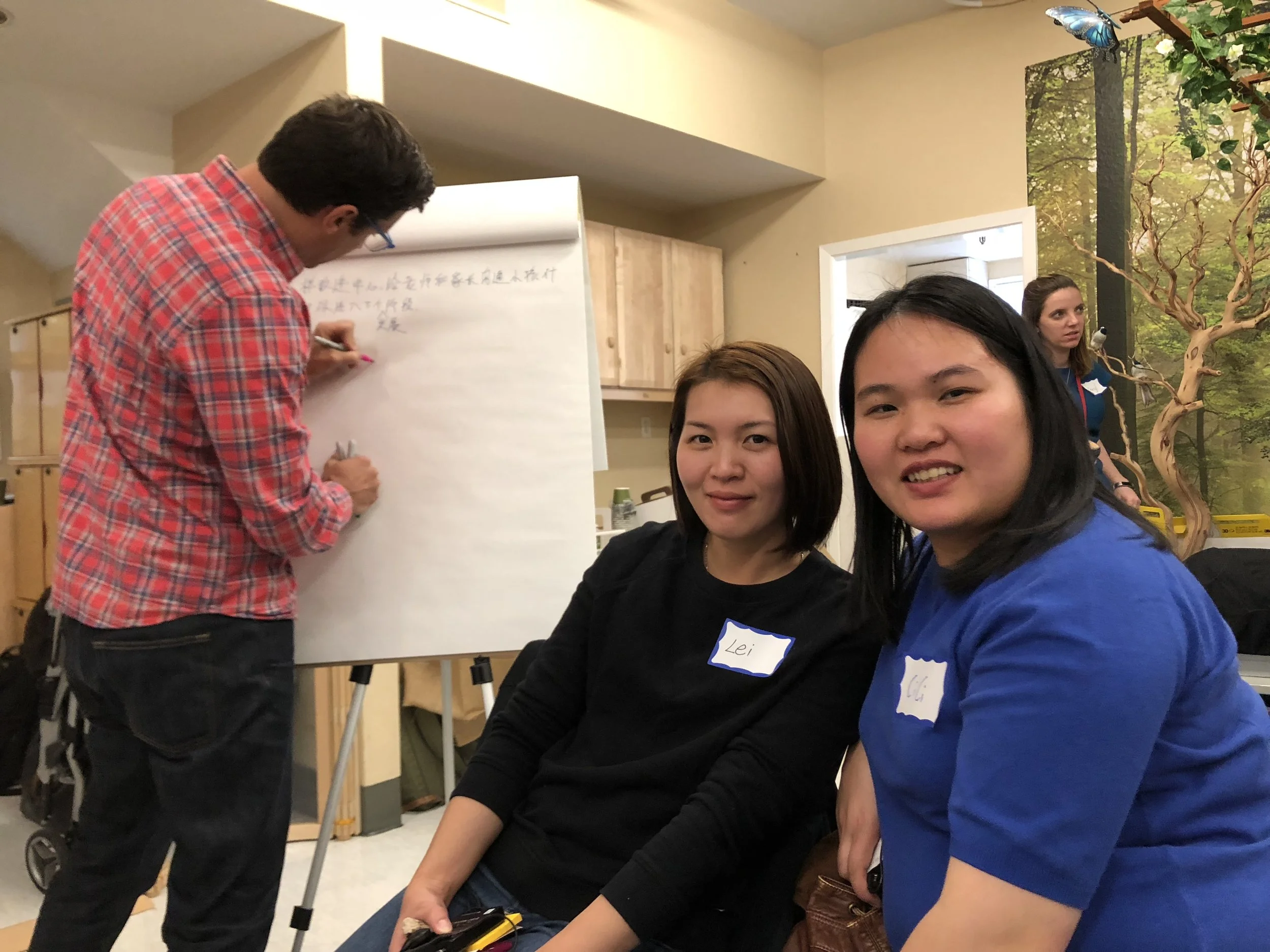 Wu Yee parents, Min Lei and Cici Guo, participate in a focus group with Matt Barry, Chief Impact Officer at The Piton Foundation