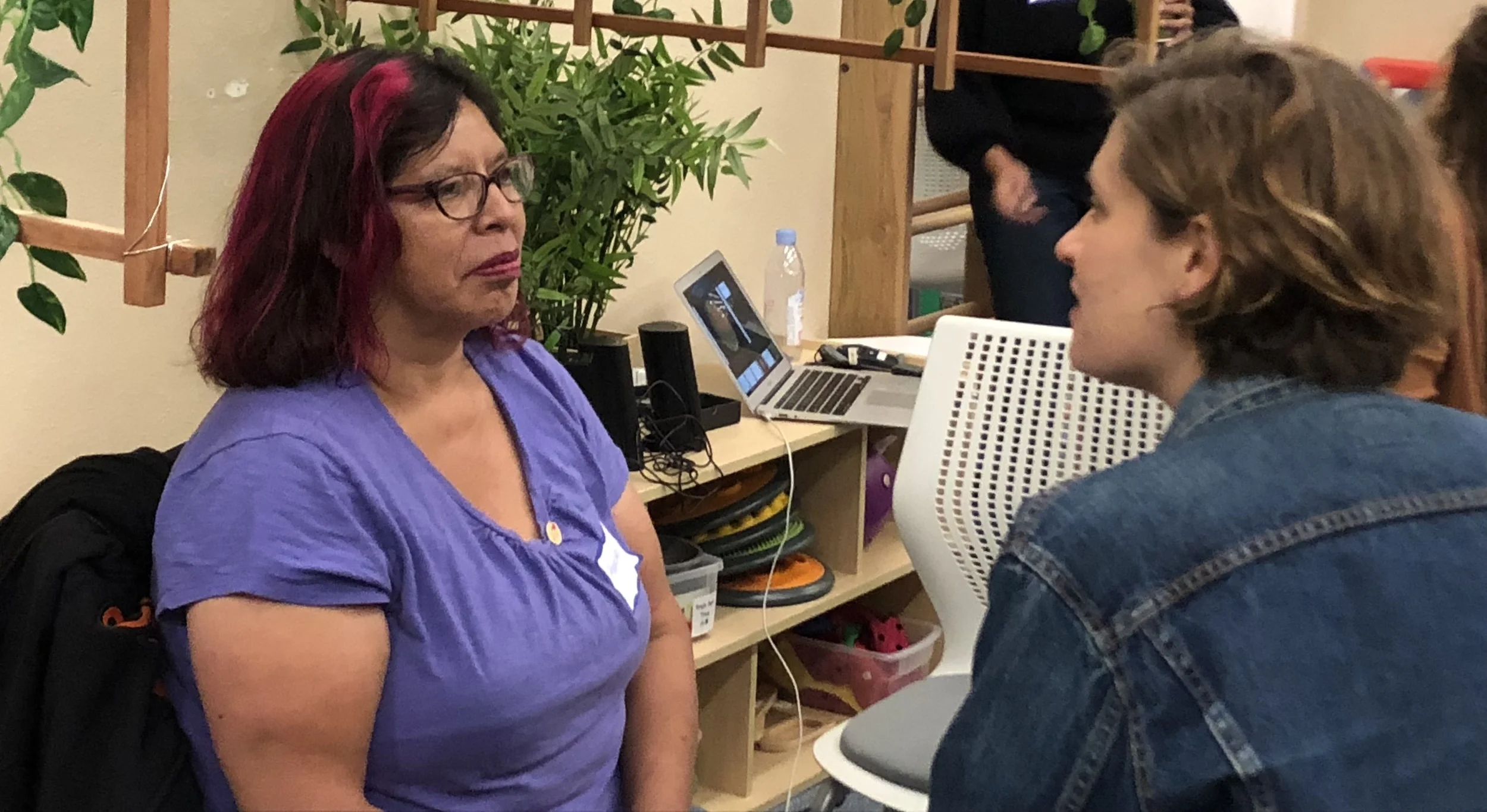 Merced Rocha, Infant Lead Teacher at New Generations Child Development Center talks with Sarah Flores, Director of Communications at The Early Learning Lab