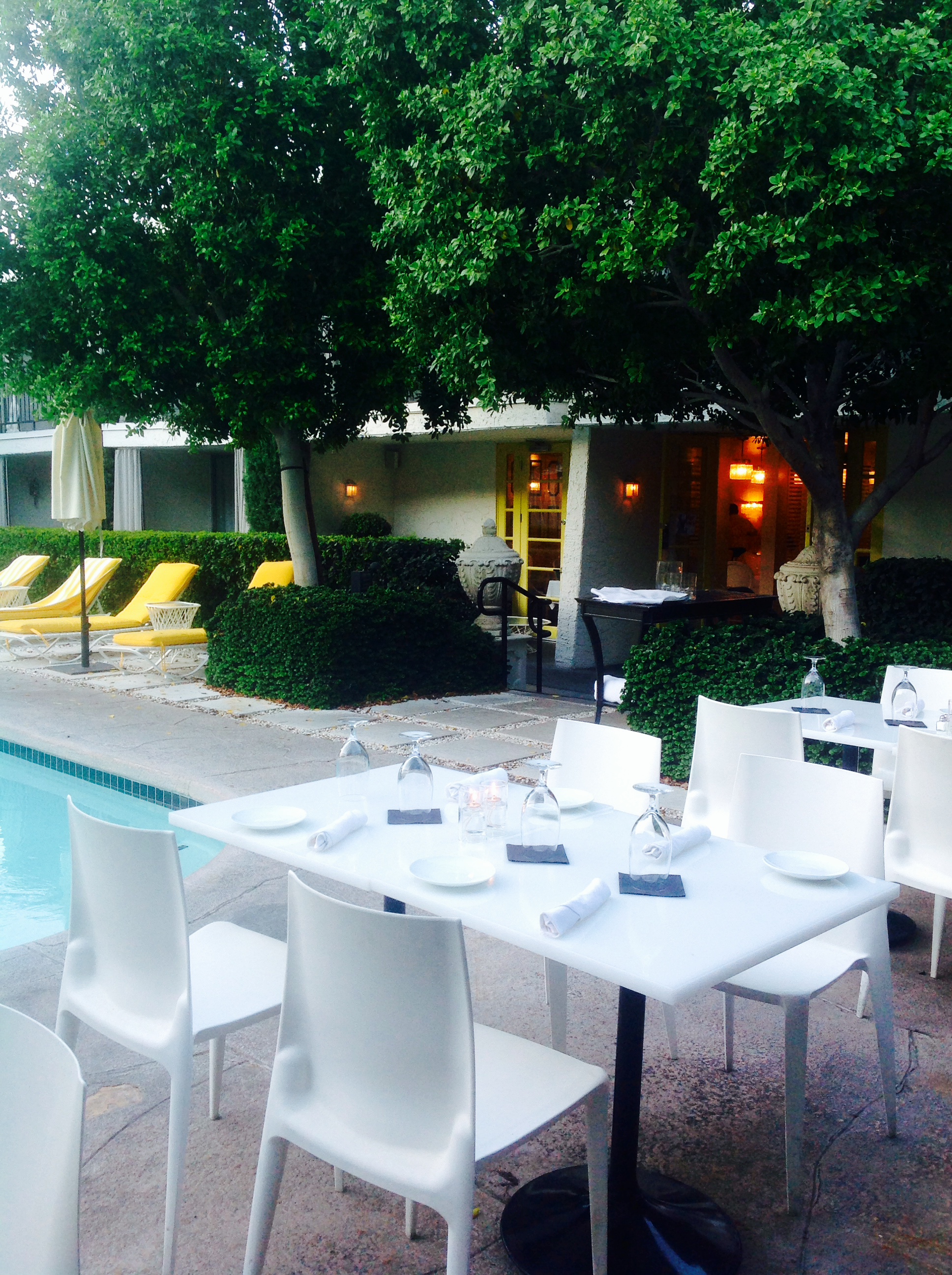 Outdoor seating by the pool.
