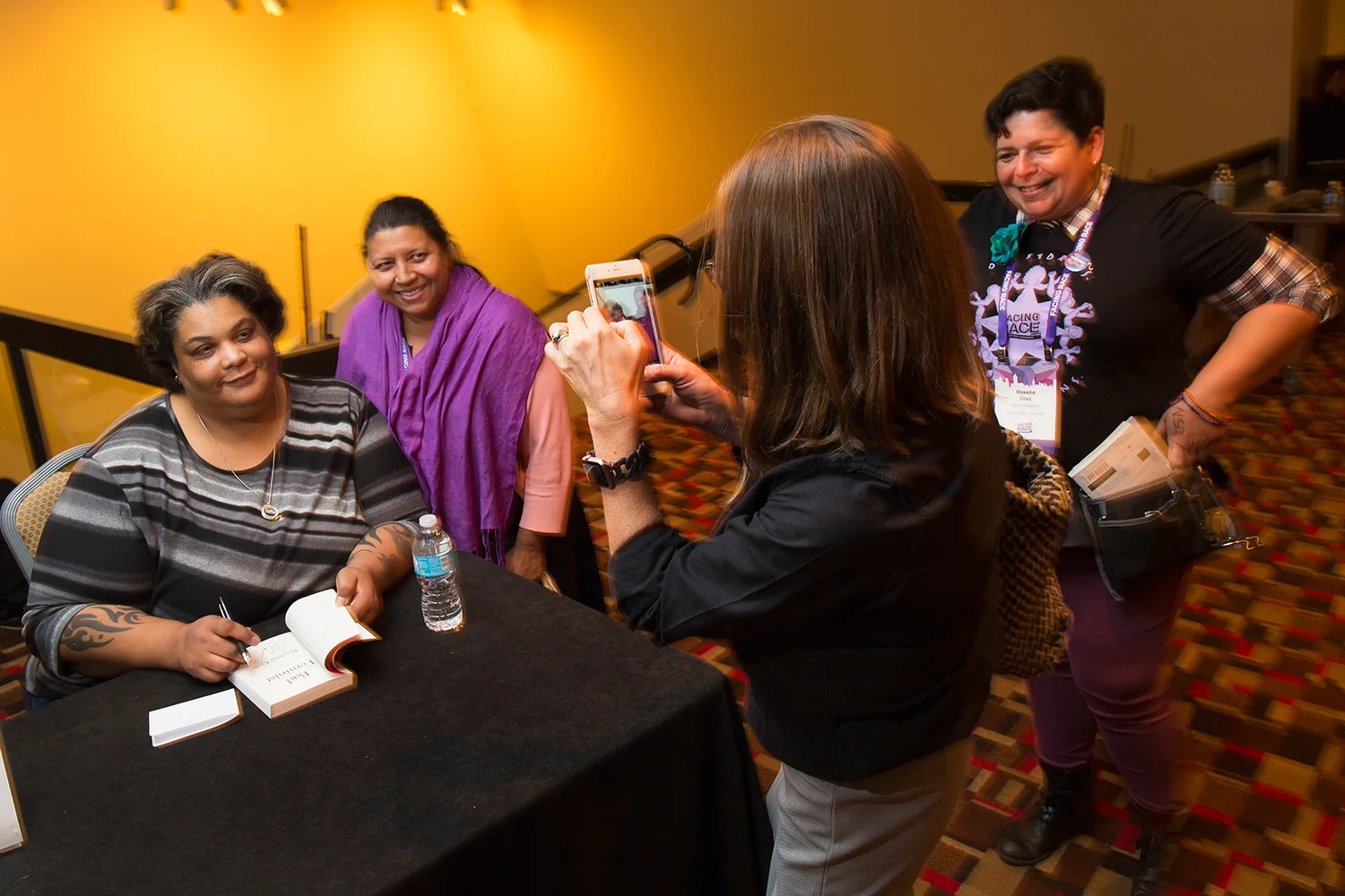 Author Roxane Gay signs books after her keynote speech at Facing Race 2016, Atlanta, GA, 11 November