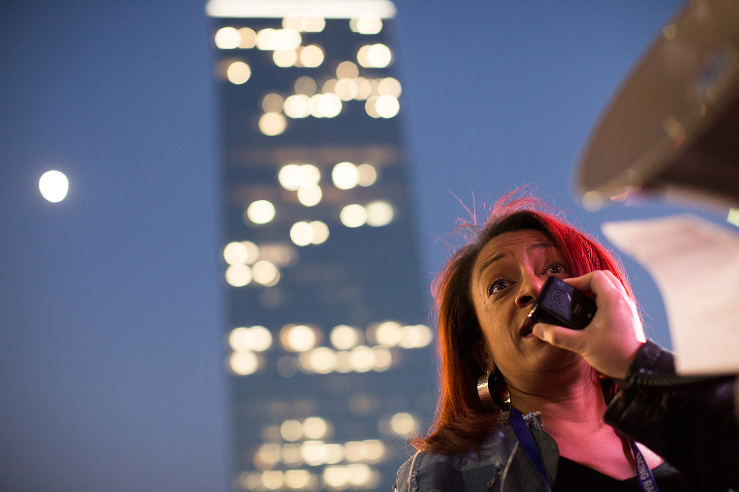  Woman speaks at anti-Trump/antihate racial justice rally across the street from CNN Center during the Facing Race 2016 conference, Atlanta, GA, 10 November 