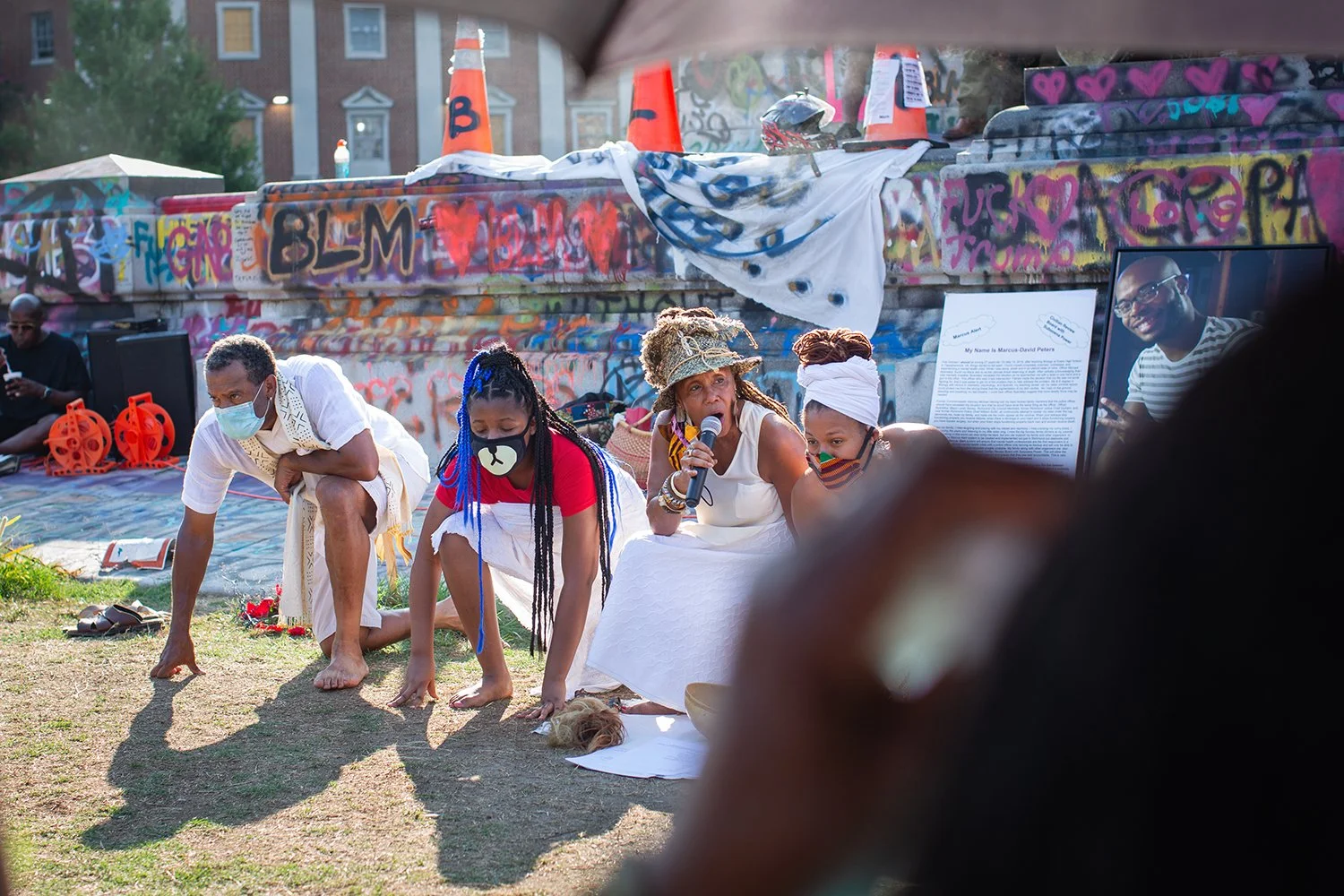 Omilade Janine Bell of the Elegba Folklore Society leads a Reclamation Drum Circle at the base of the Robert E. Lee monument, Richmond, VA. 2020