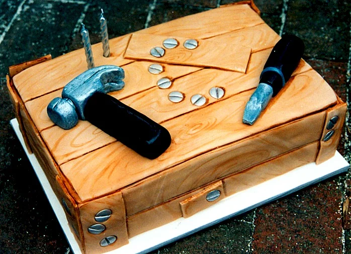 Small tools of fondant made for small hands with the wood look cake for Christopher
