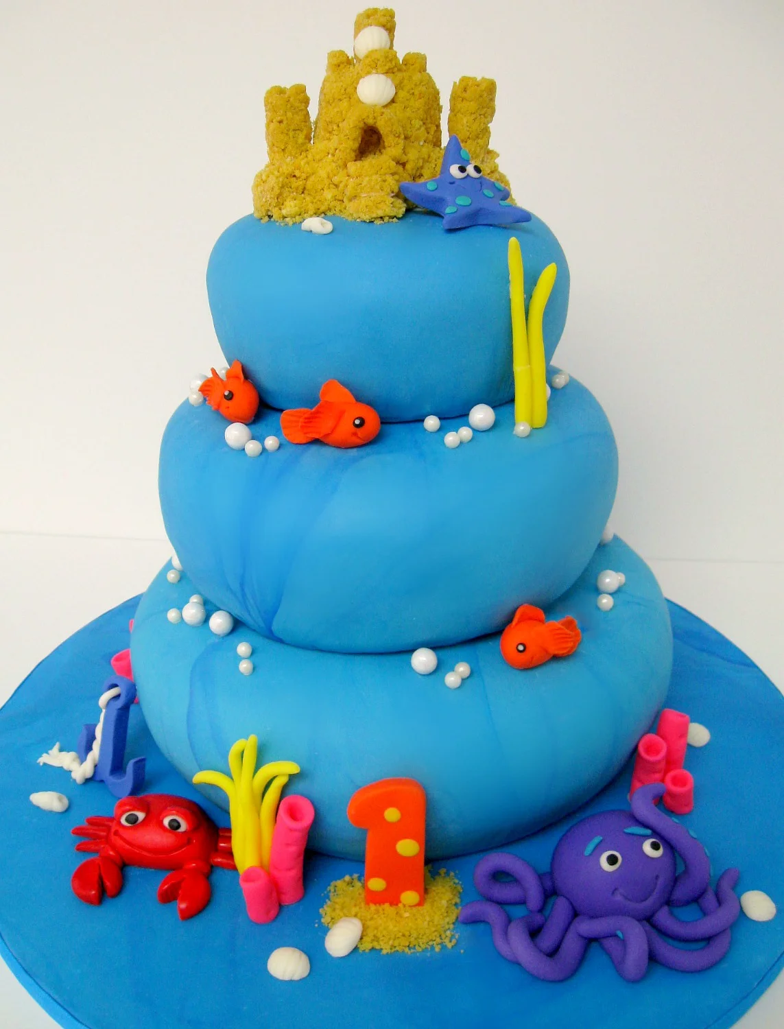 Three layers of marble cake for this one year old's under the sea birthday celebration