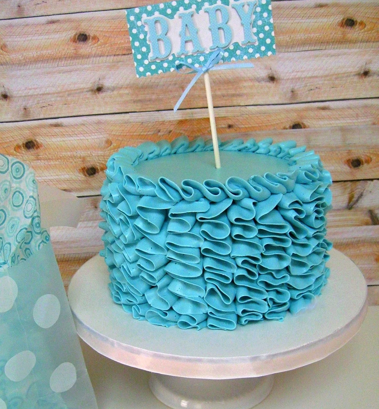 Buttercream ruffle design for a small restaurant baby shower thrown by best friends