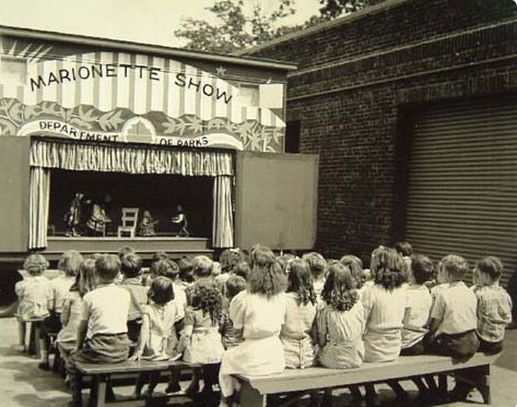 Children of New York City watching a Marionette Show in the 1930's
