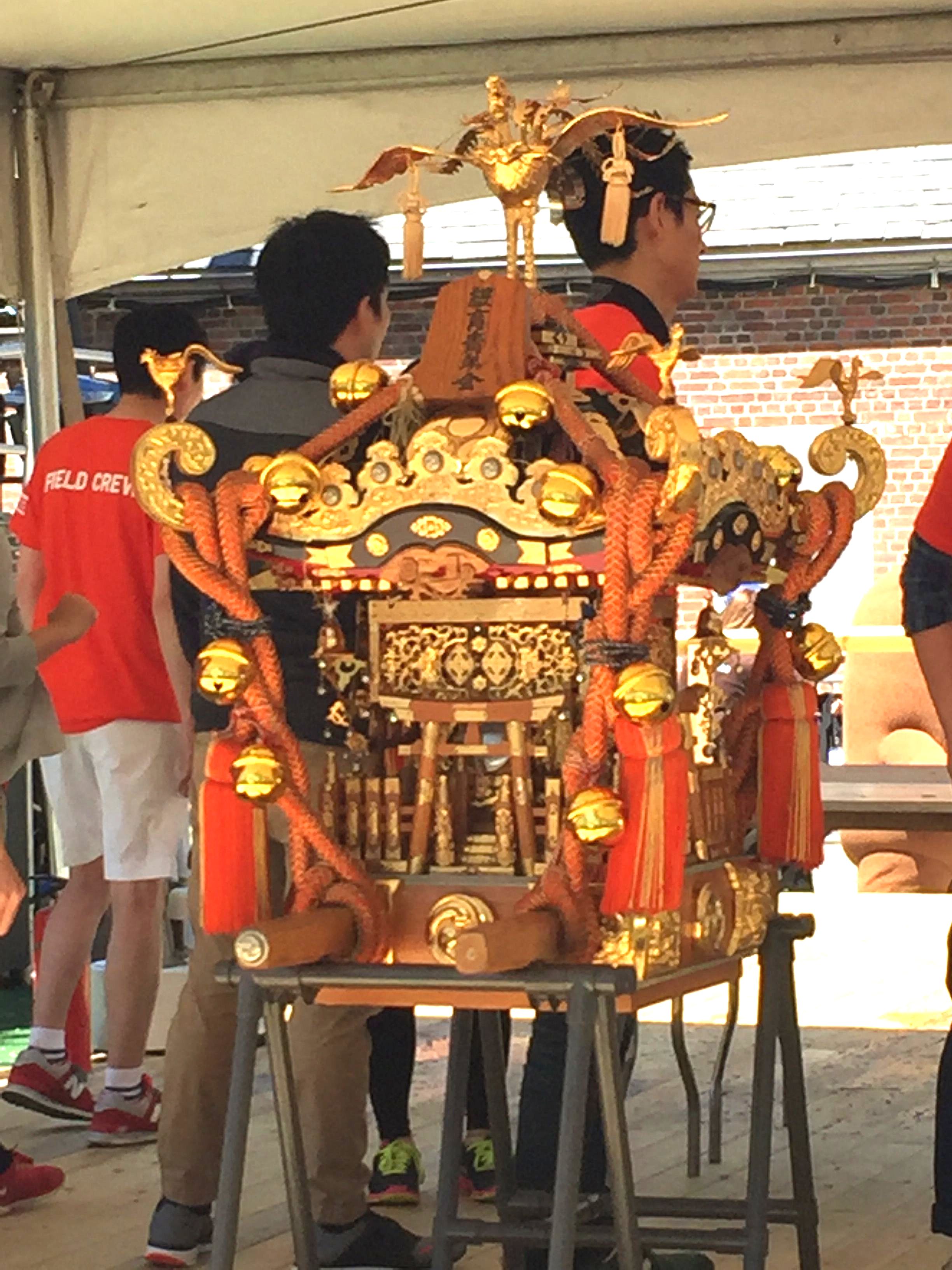 The mikoshi, a portable Shinto shrine carried in the festival parade.