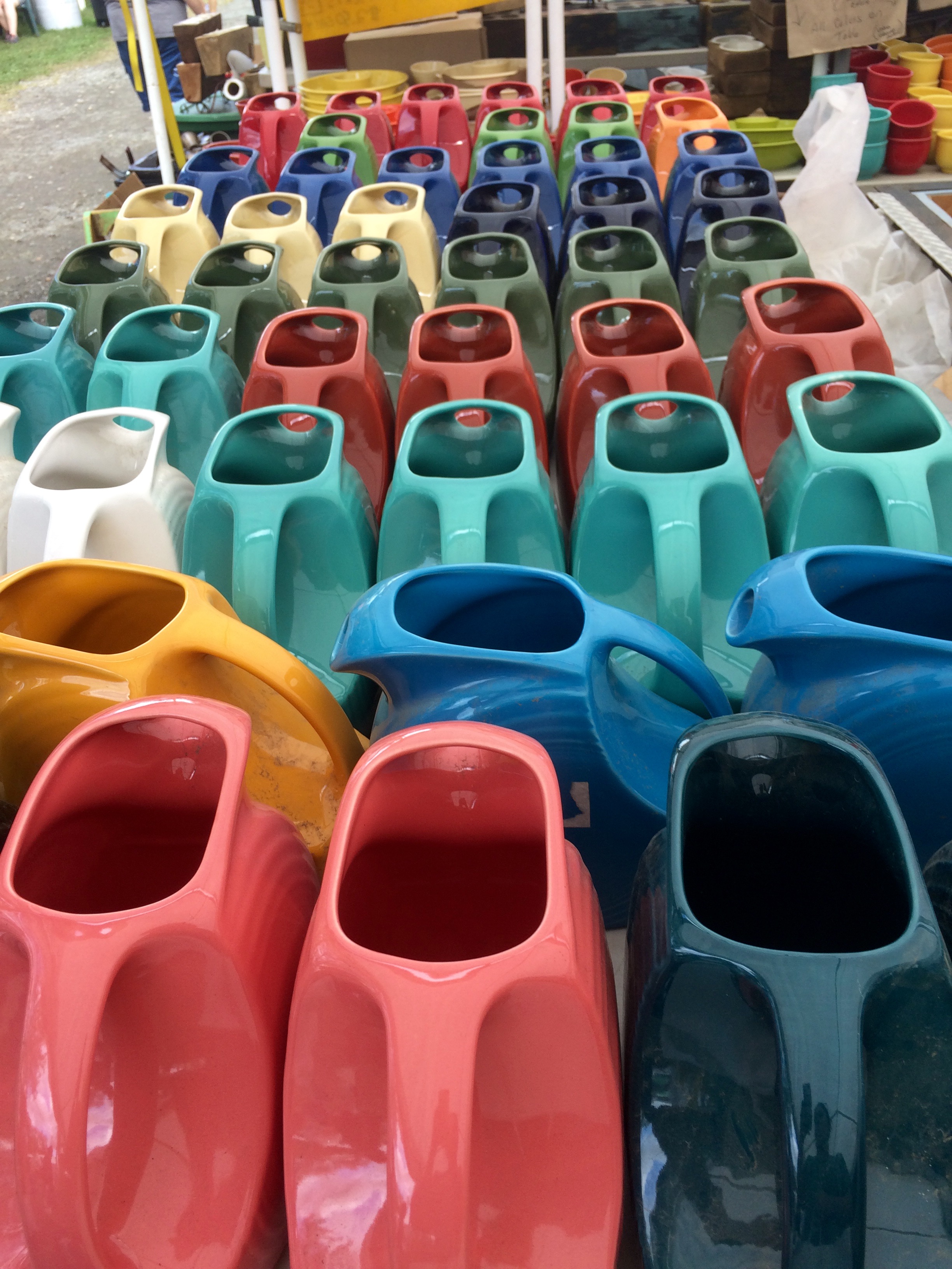 Fiestaware might be a little colorful for my everyday kitchen purposes, but it looks so lovely all laid out in its rainbow of colors.