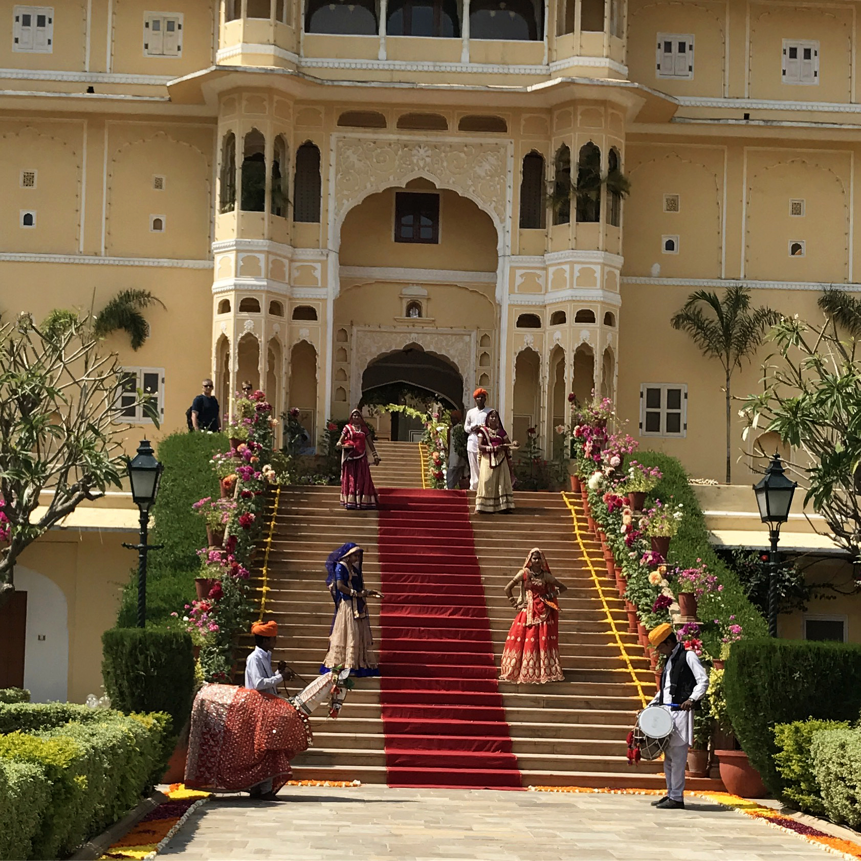 This is how we were greeted upon arriving at the wedding venue, near Jaipur. Already the flowers, colors, and clothing was incredible!