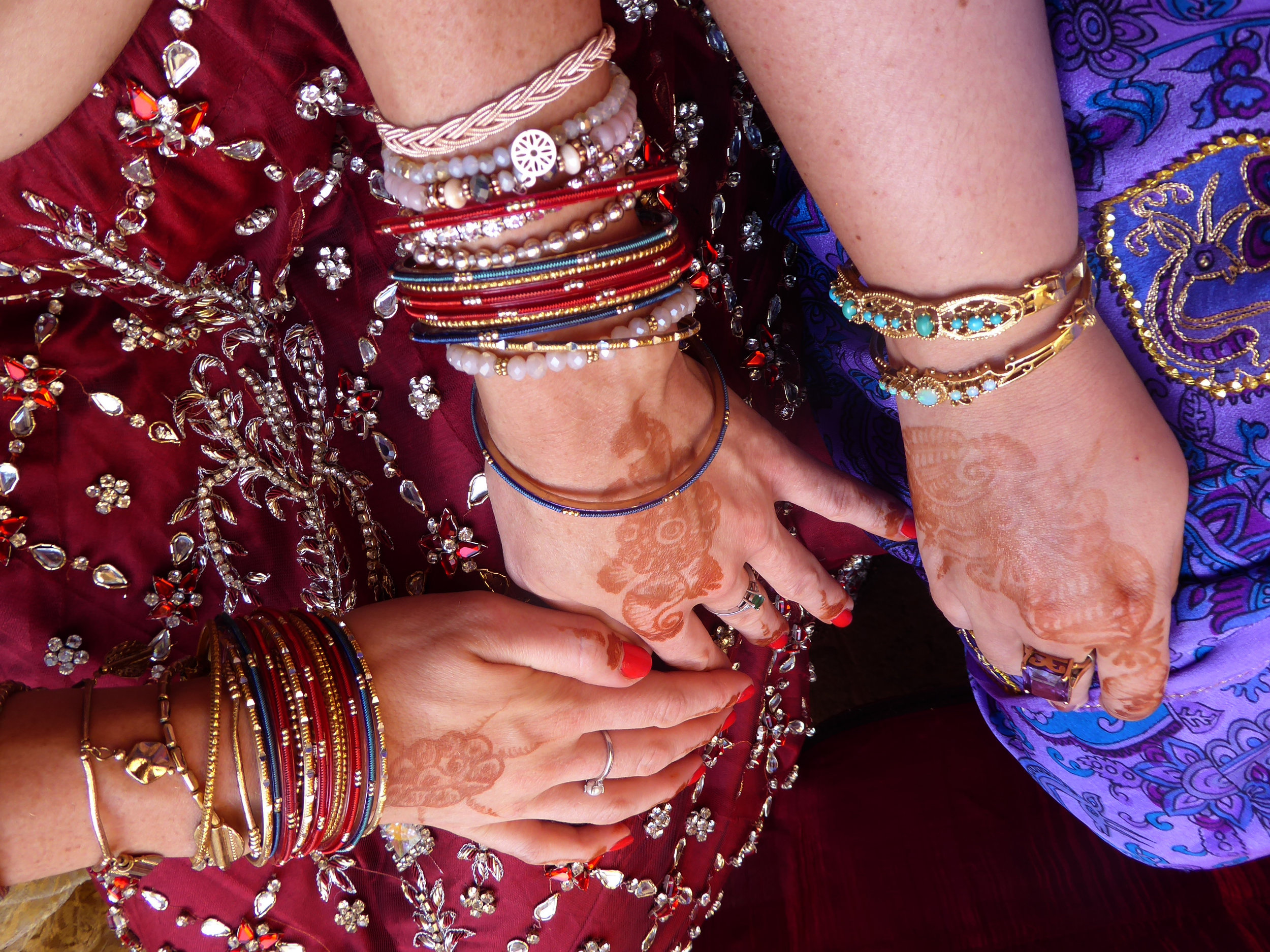 Henna and bangles galore! I loved all of the sequins and embellishments on everyone's wedding attire.