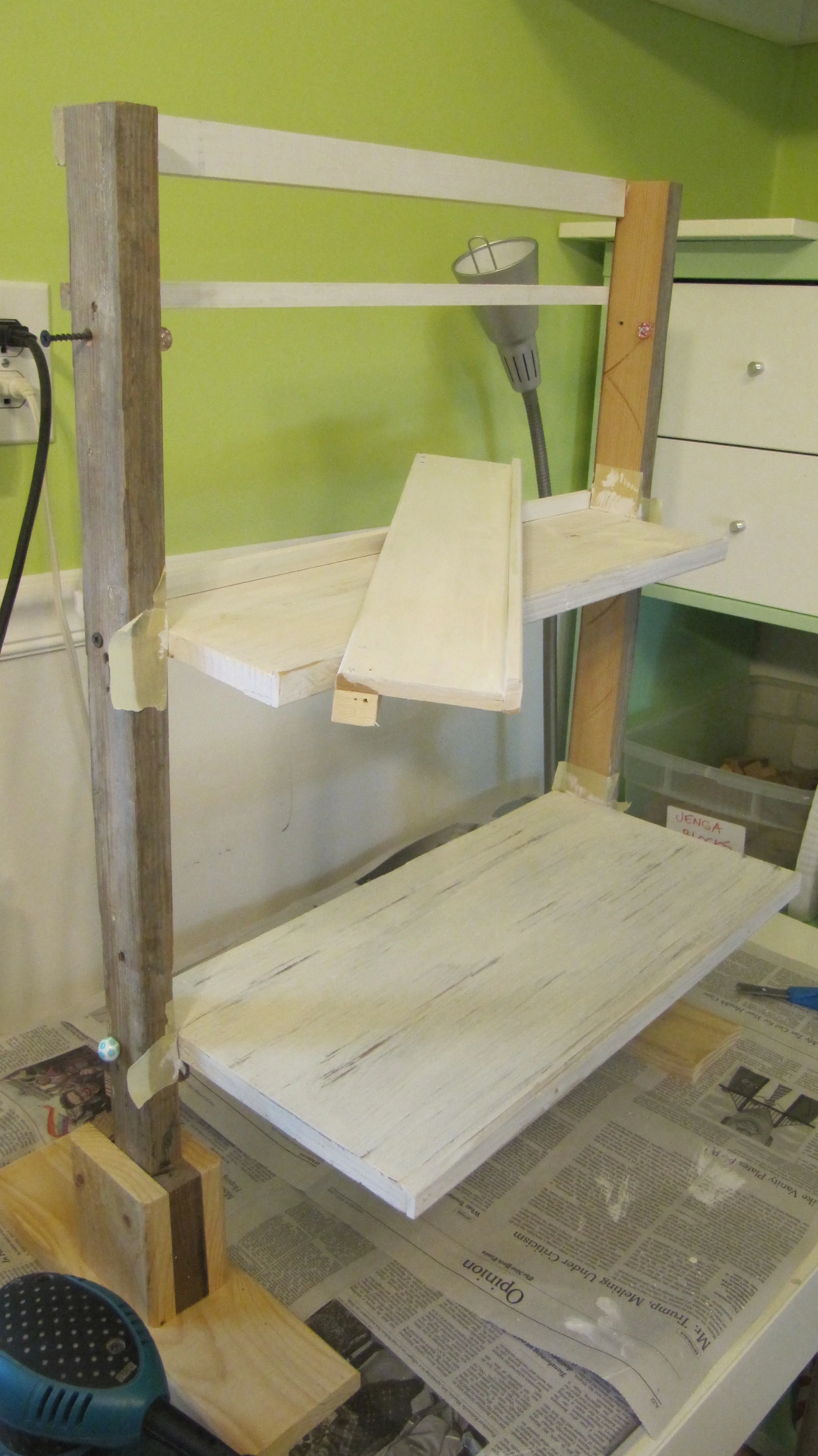 I decided to paint the shelves as the different kinds of wood was distracting from my boxes. Just with gesso I already had in stock. Note - sometimes I used my glass beads as shelf stoppers!