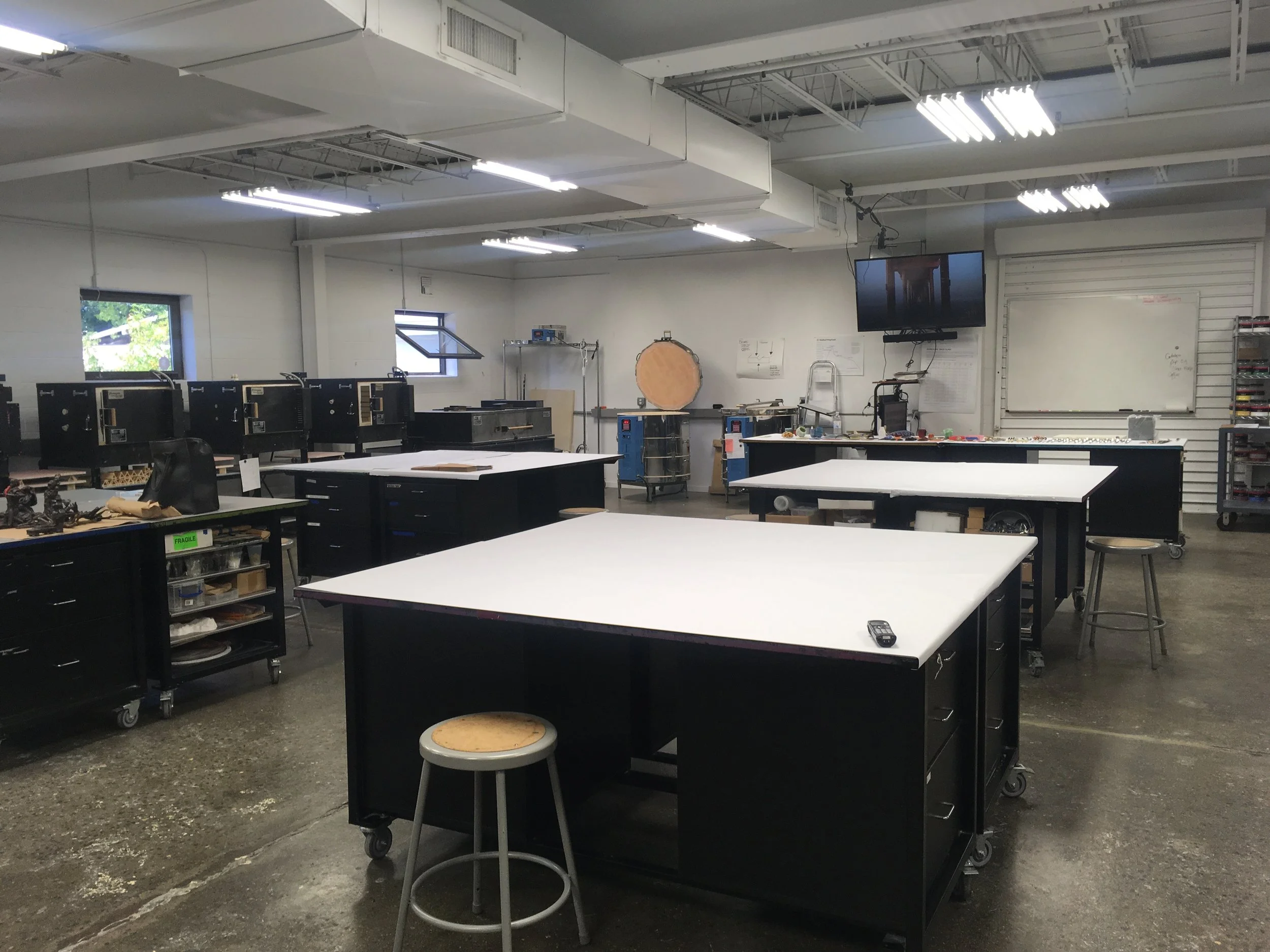 The Studio in the back, full of kilns and well lit work tables 