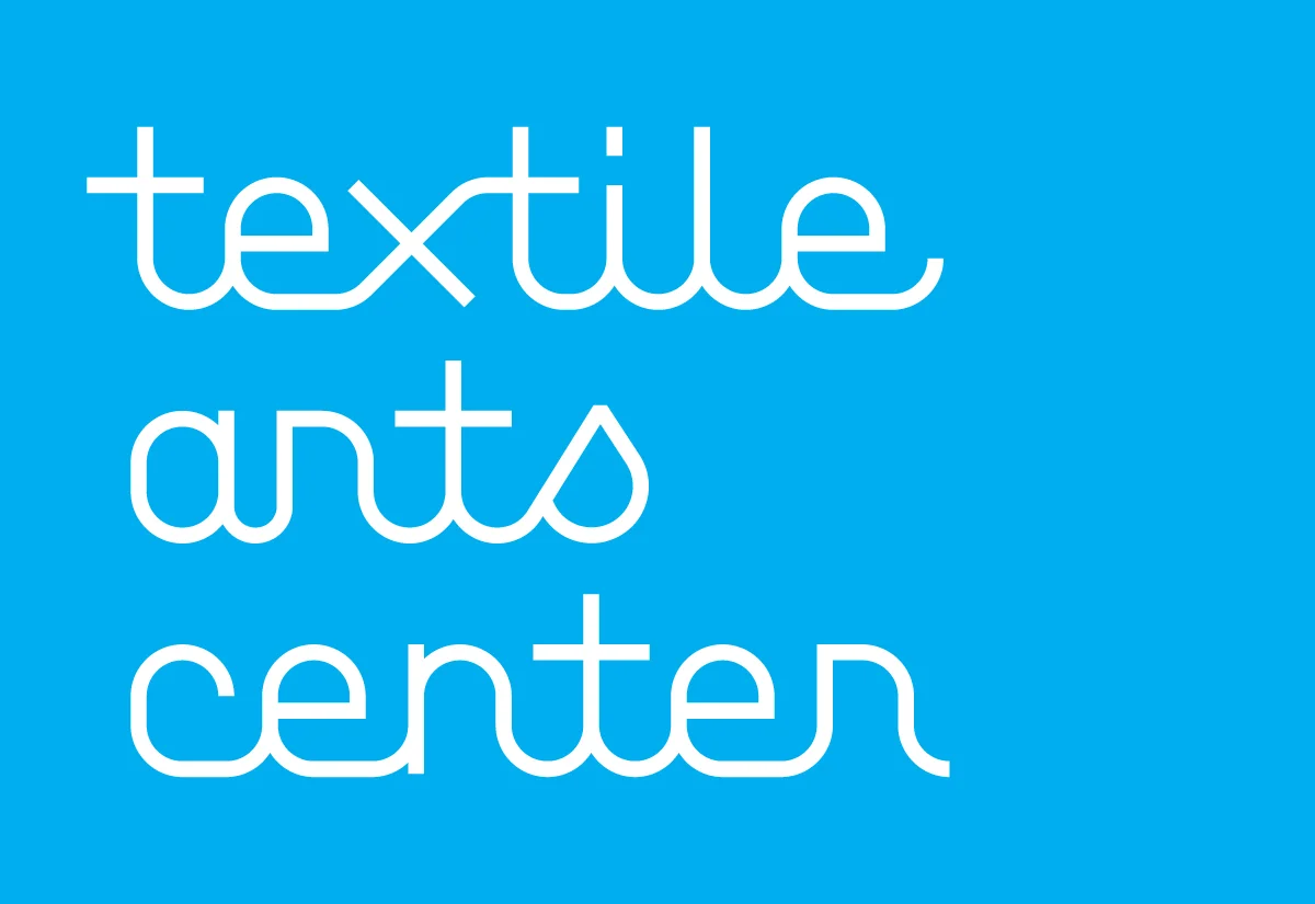 TAC_logo_negative_cyan_cs2.jpg