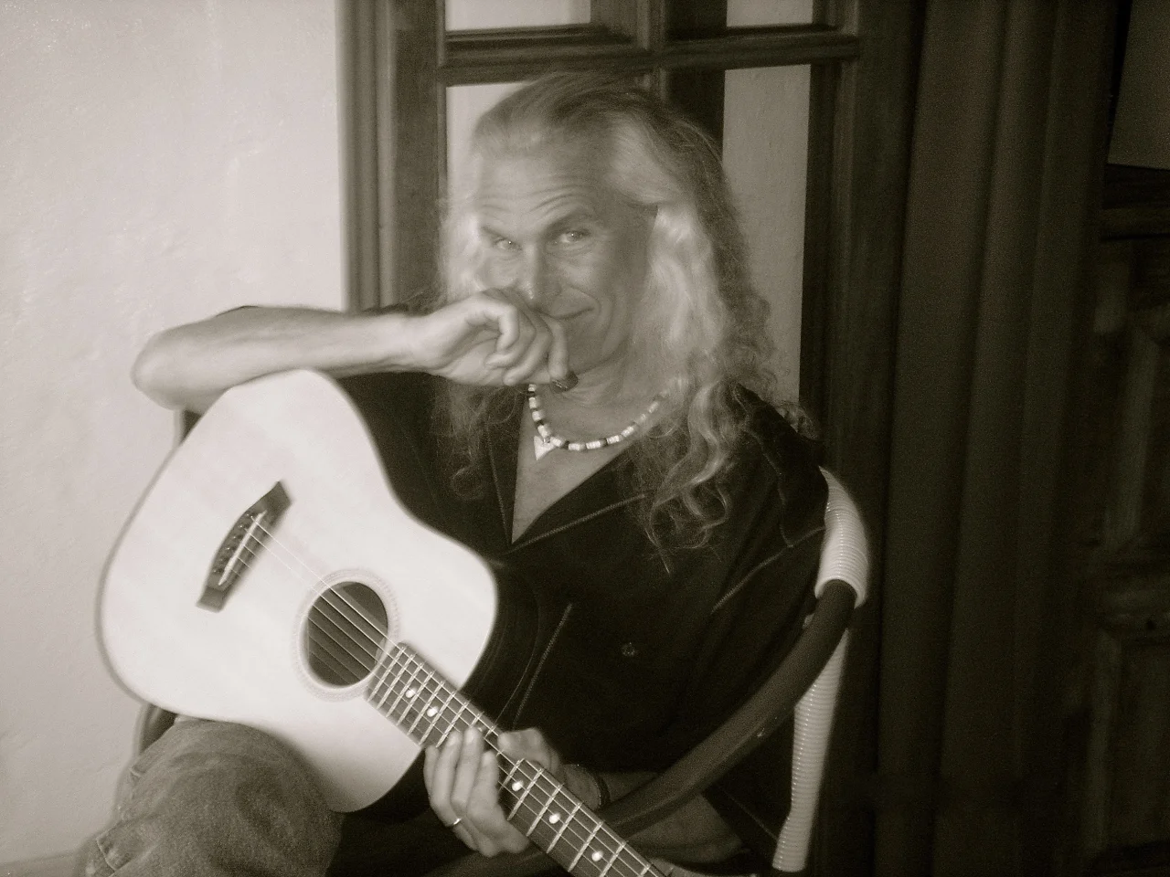 Chick Petersen and his guitar Photo by Deborah Parrish