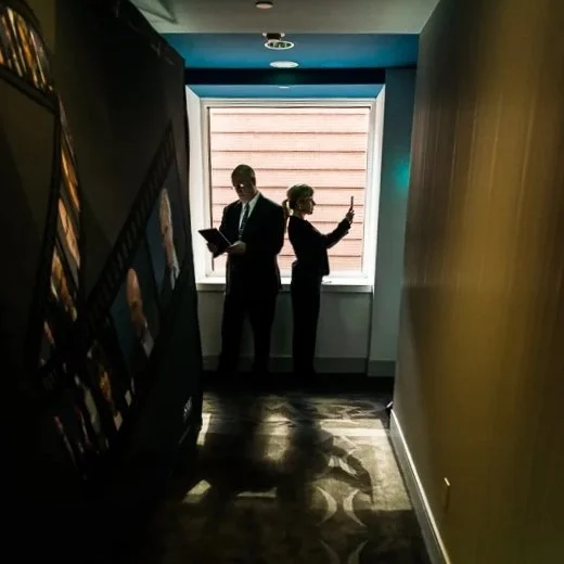 Leadership Team Strategic Alignment During Organizational Transition:  Two business leaders in discussion during organizational transition and strategic decision-making