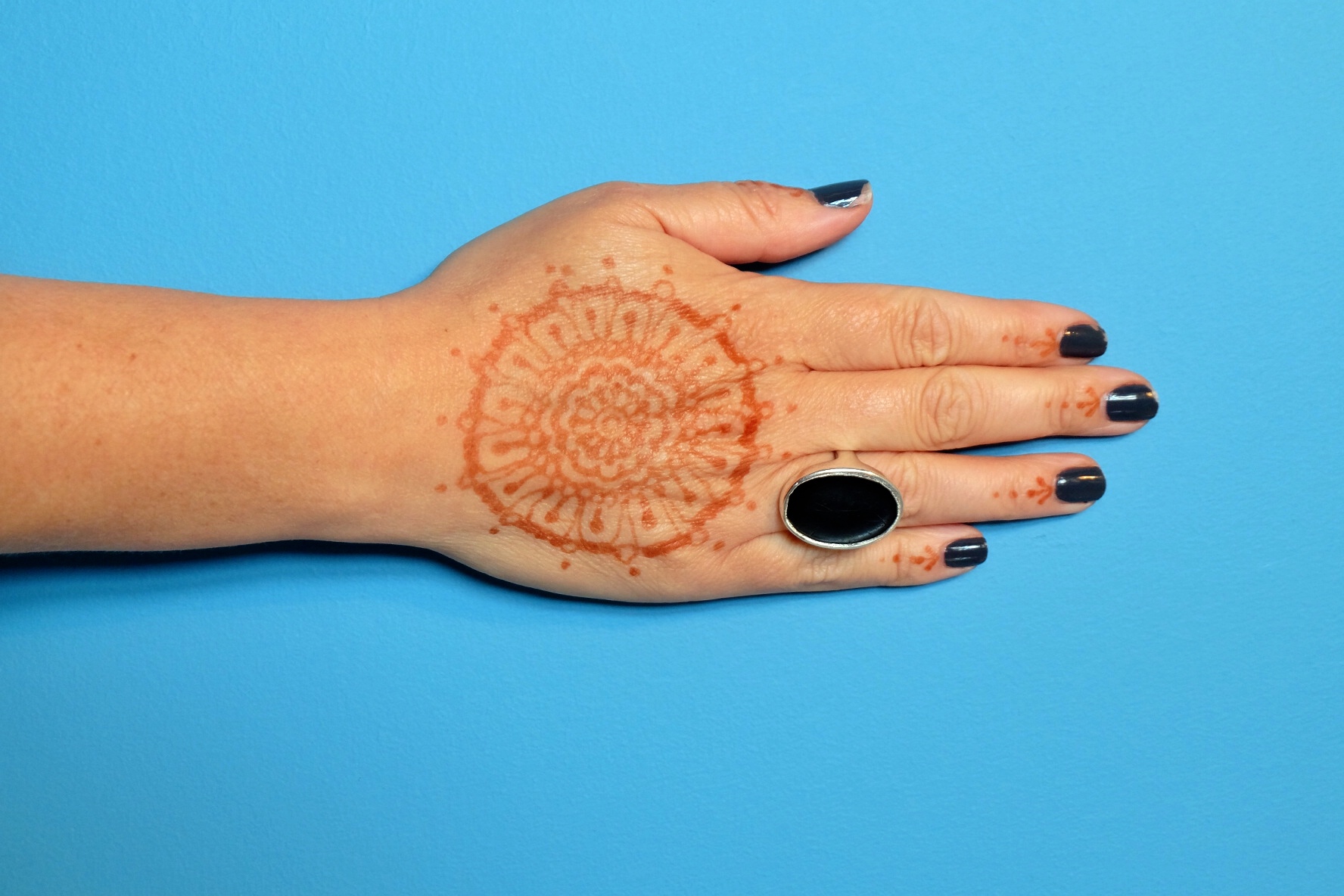 my mums hand with the henna that my clever cousin did, beautiful.