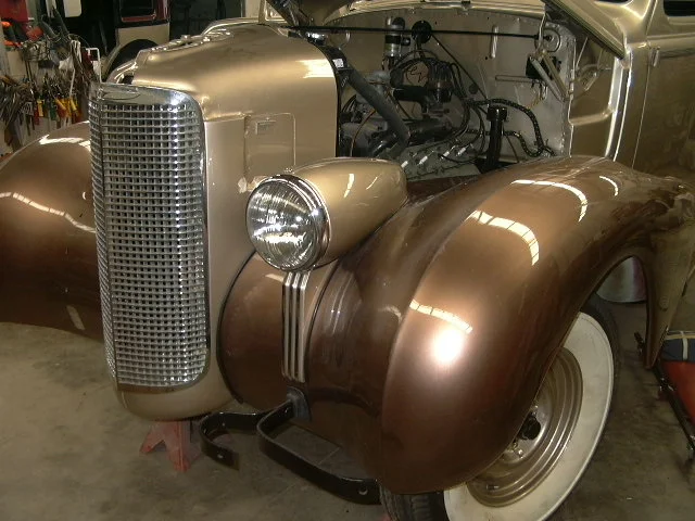 The chassis was complete and overhauled. The chassis was painted in gloss black. The body shell and body panels were sandblasted to remove the paint work and to clean the panel from rust. This model did not originally come with six wheel equip. The customer liked the idea of converting the vehicle to six wheel equip so the brackets and recesses were fitted to the vehicle. The lead over the panel joins was removed and the rust underneath was cleaned.