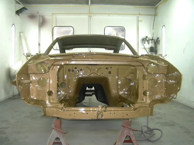 The body shell was straightened and pulled into alignment. The doors, bonnet and front guards were also checked for alignment throughout the pulling process. The body shell was completely stripping down further with the underside having stone-guard sprayed like the original factory finish
