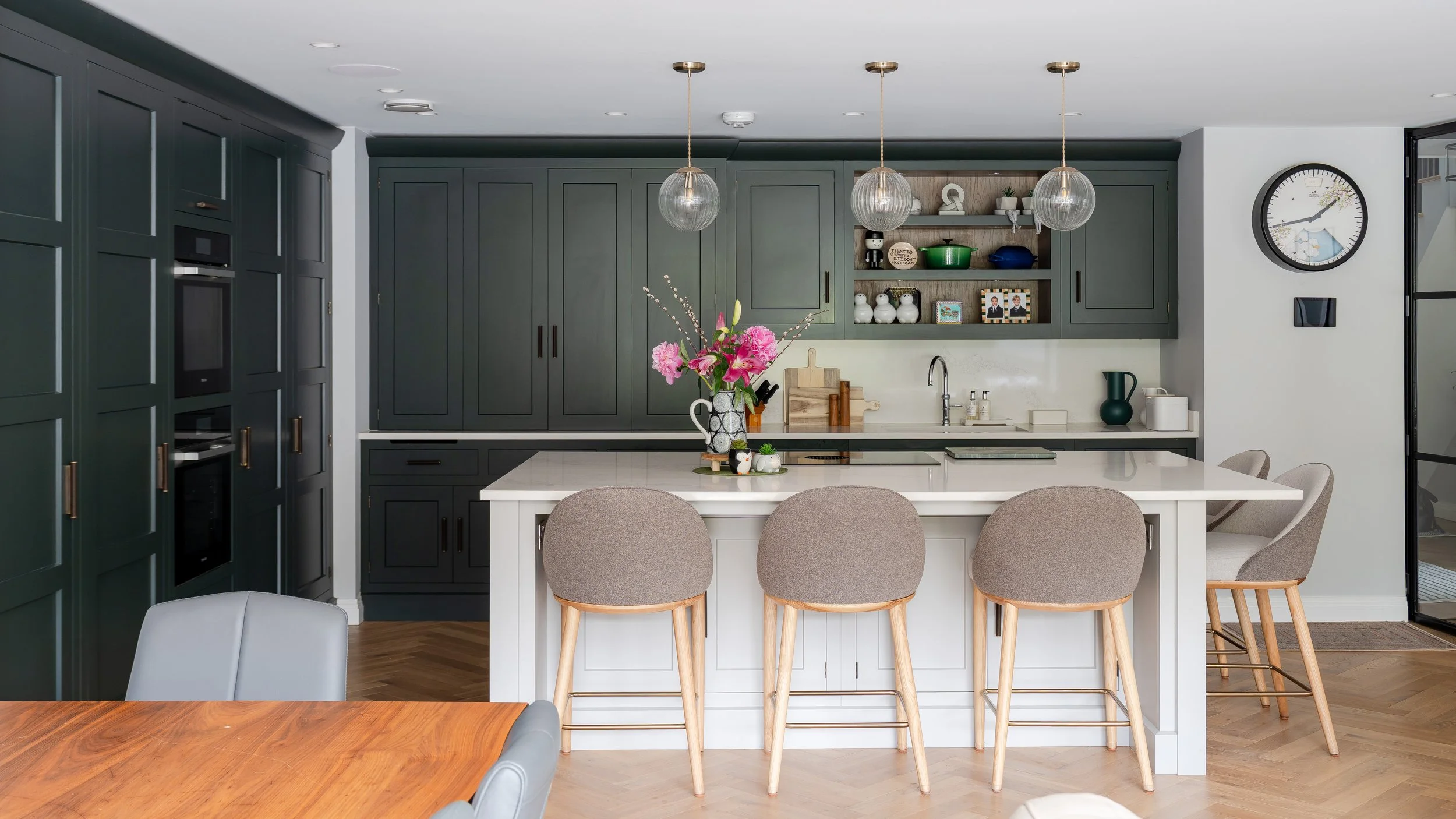    Extensive bespoke joinery has been incorporated throughout the home, creating elegant, tailor-made interiors that combine functionality with refined design. Premium timber flooring flows seamlessly through the living spaces, while a natural slate 