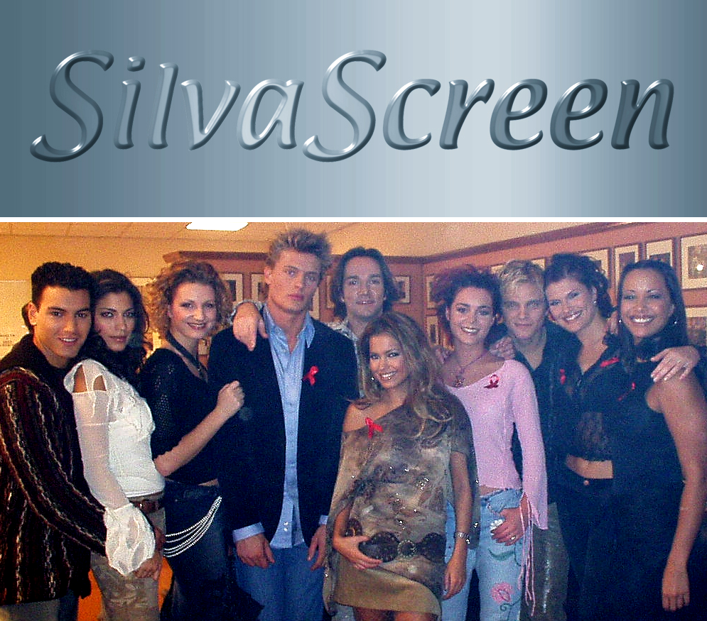 SilvaScreen groepsfoto met (vlnr) Mohammed Chaara, Touriya Haoud, Denise van Rijswijk, Winston Post, Spiros Chalos, Sylvie Meis, Kim-Lian van der Meij, Sander Foppele, Anouk van Nes (gast) en Sonja Silva (2002)
