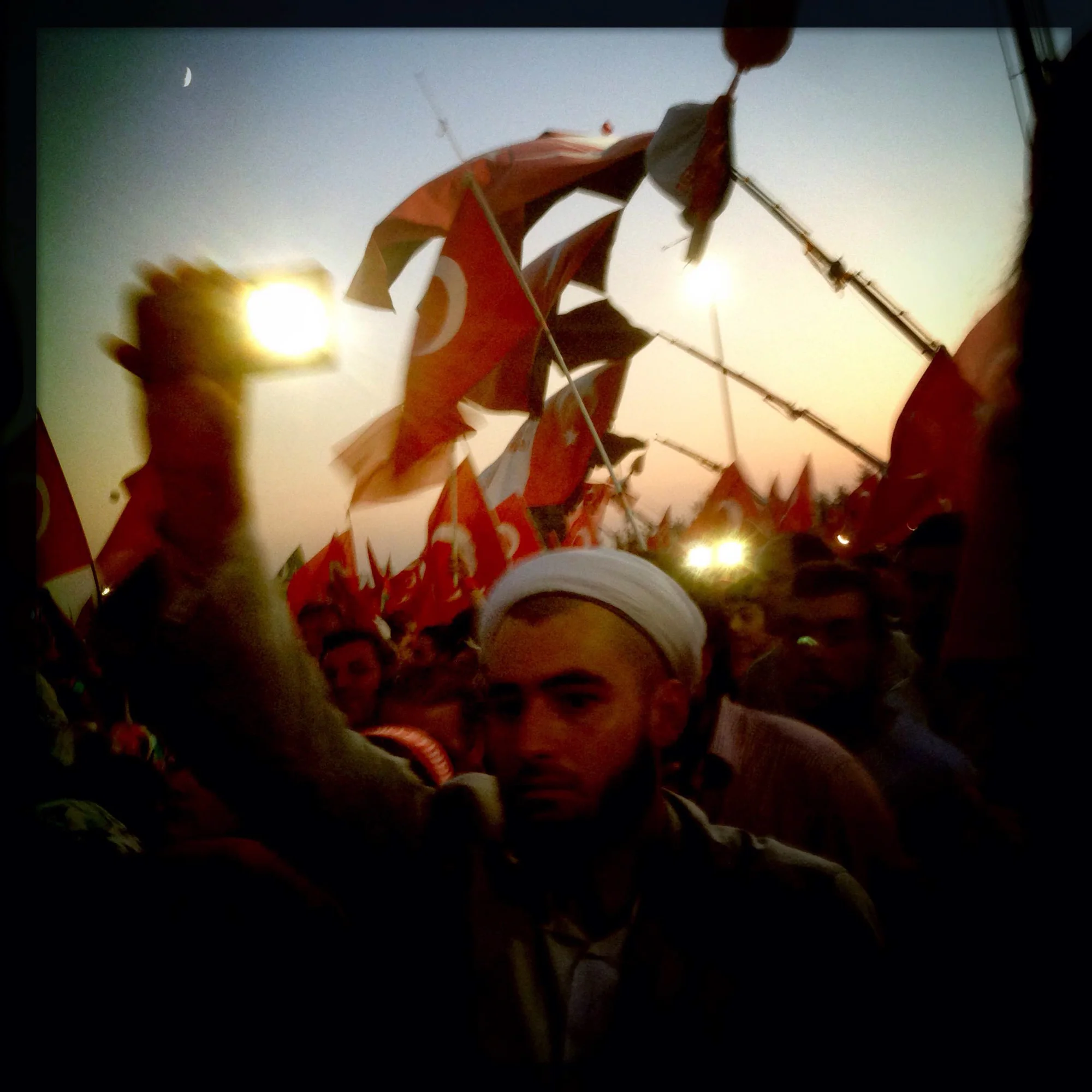 Aug. 7, 2016 - Istanbul, Turkey. Rally goers shine their lights at the massive government-sponsored democracy rally for unity in Turkey. 