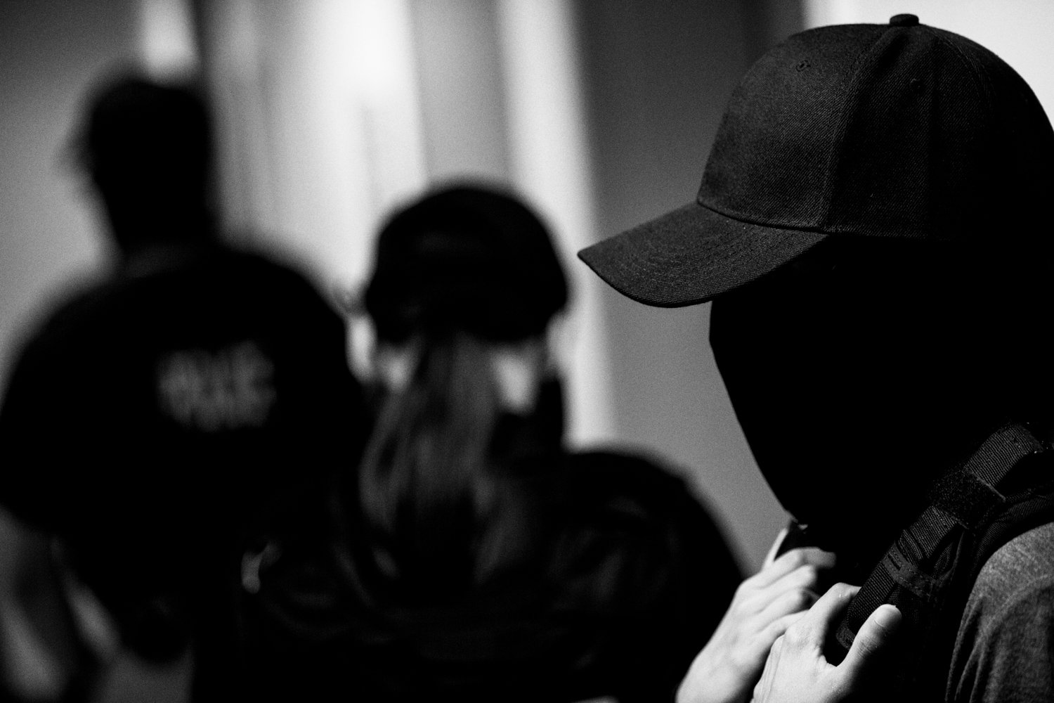  10:17 AM: Federal agents stand in a hall in the Jacob K Javits Federal Building in New York on 16 July 2025.  Julius Constantine Motal/ The Guardian  