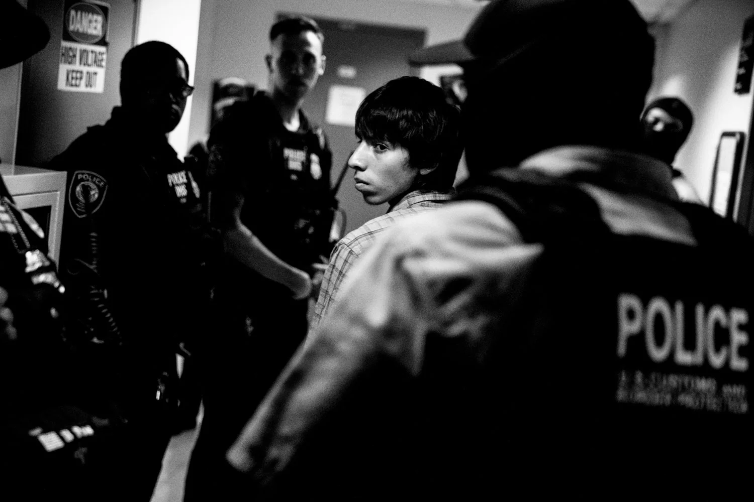  1:39PM: A young man is detained by federal agents after an immigration hearing in the Jacob K Javits federal building in New York on 16 July 2025.   Julius Constantine Motal/ The Guardian   Selected for American Photography 42 