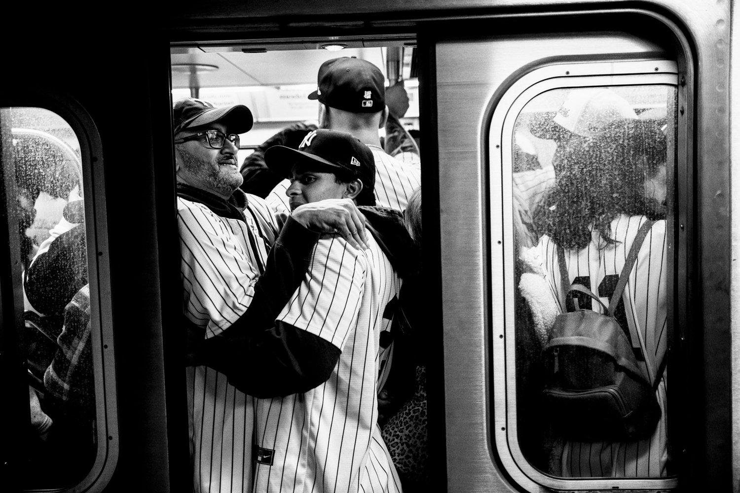  Yankees fans cram themselves into an uptown 4 train bound for Yankee Stadium in New York on October 28, 2024. Game 3 of the World Series brought the tournament back to the Bronx for the first time in 15 years. The Dodgers won the first two games.  J