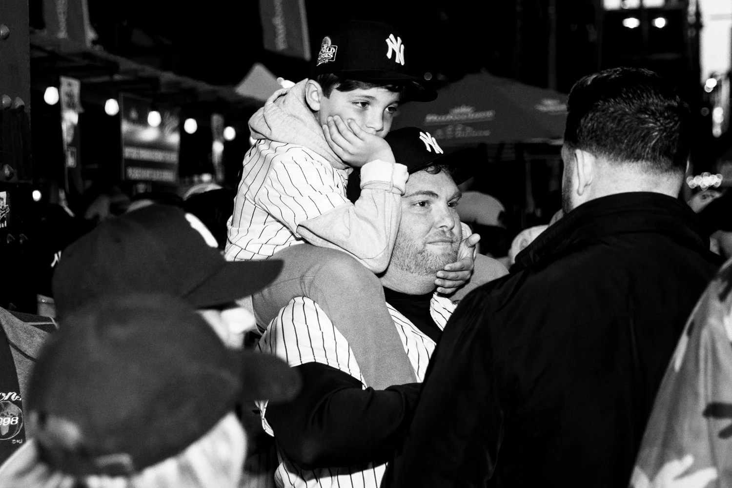  Yankees fans stand outside Stan's Sports Bar near Yankee Stadium ahead of Game 3 of the World Series in the Bronx, New York, on 28 October 2024.  Julius Constantine Motal/ The Guardian  