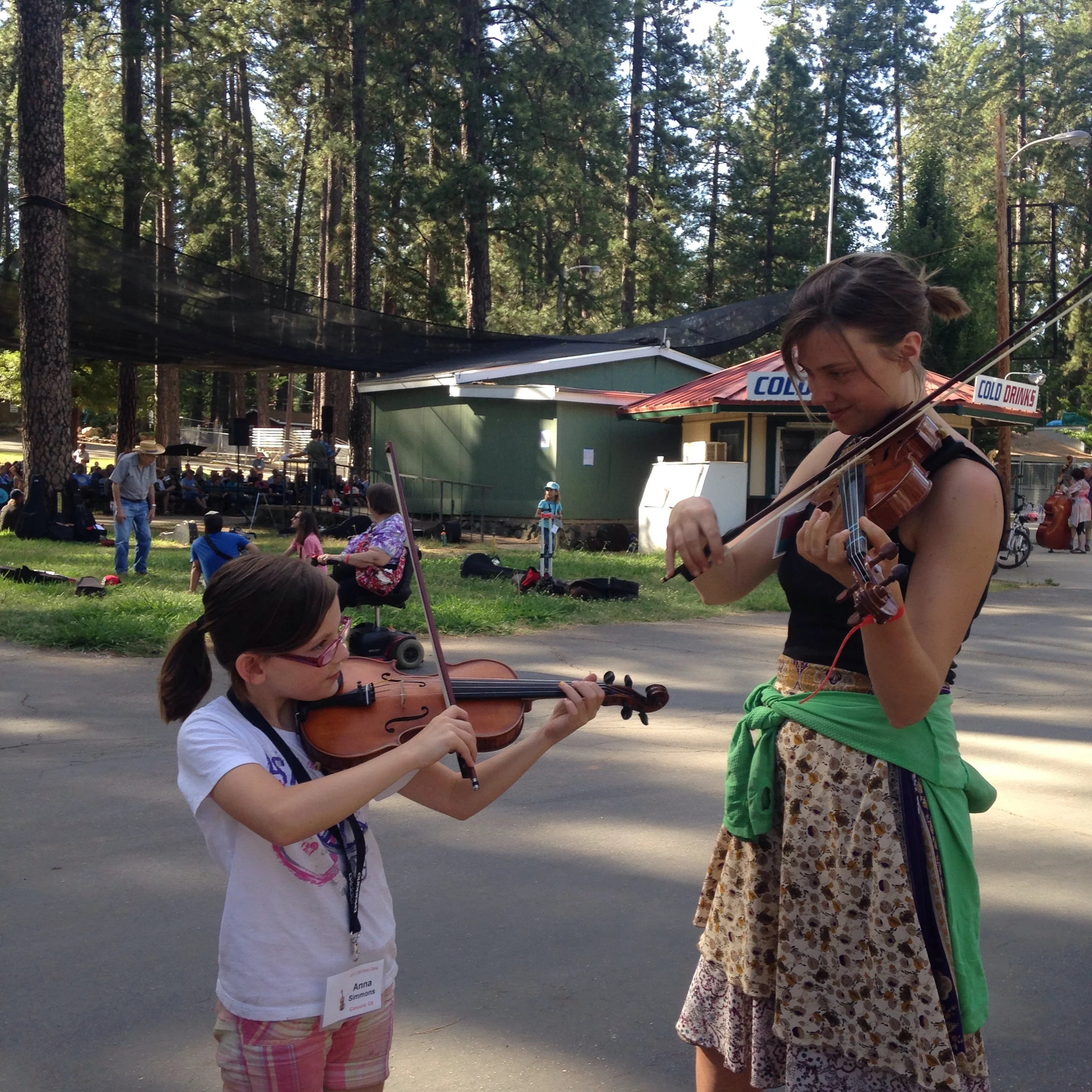 Gettin pro tips from my 10 year old classmate Anna at the CBA Music Camp. The age range in our class was 8-65 years old.