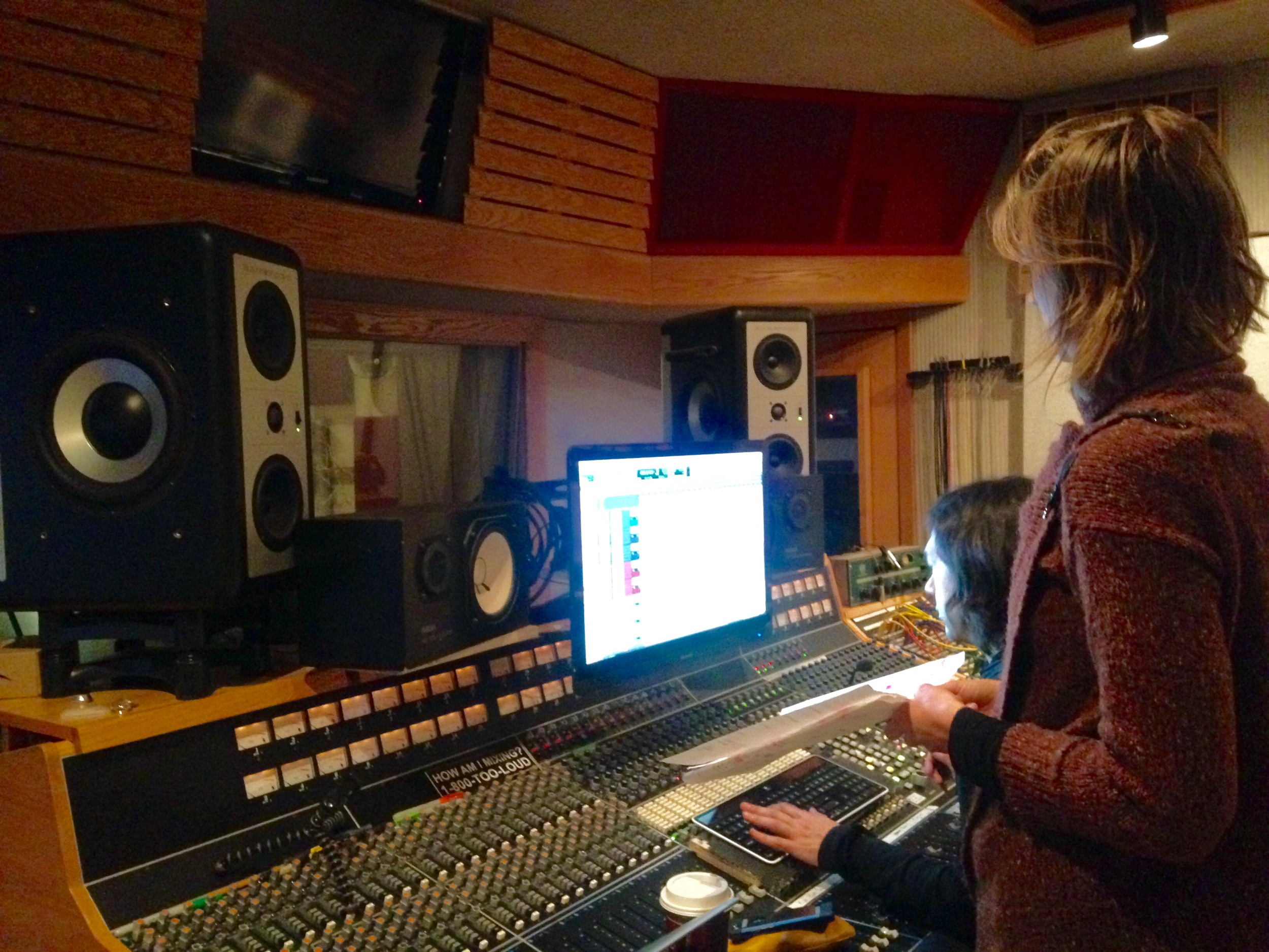 Us listening as Andrew did some percussion overdubs.