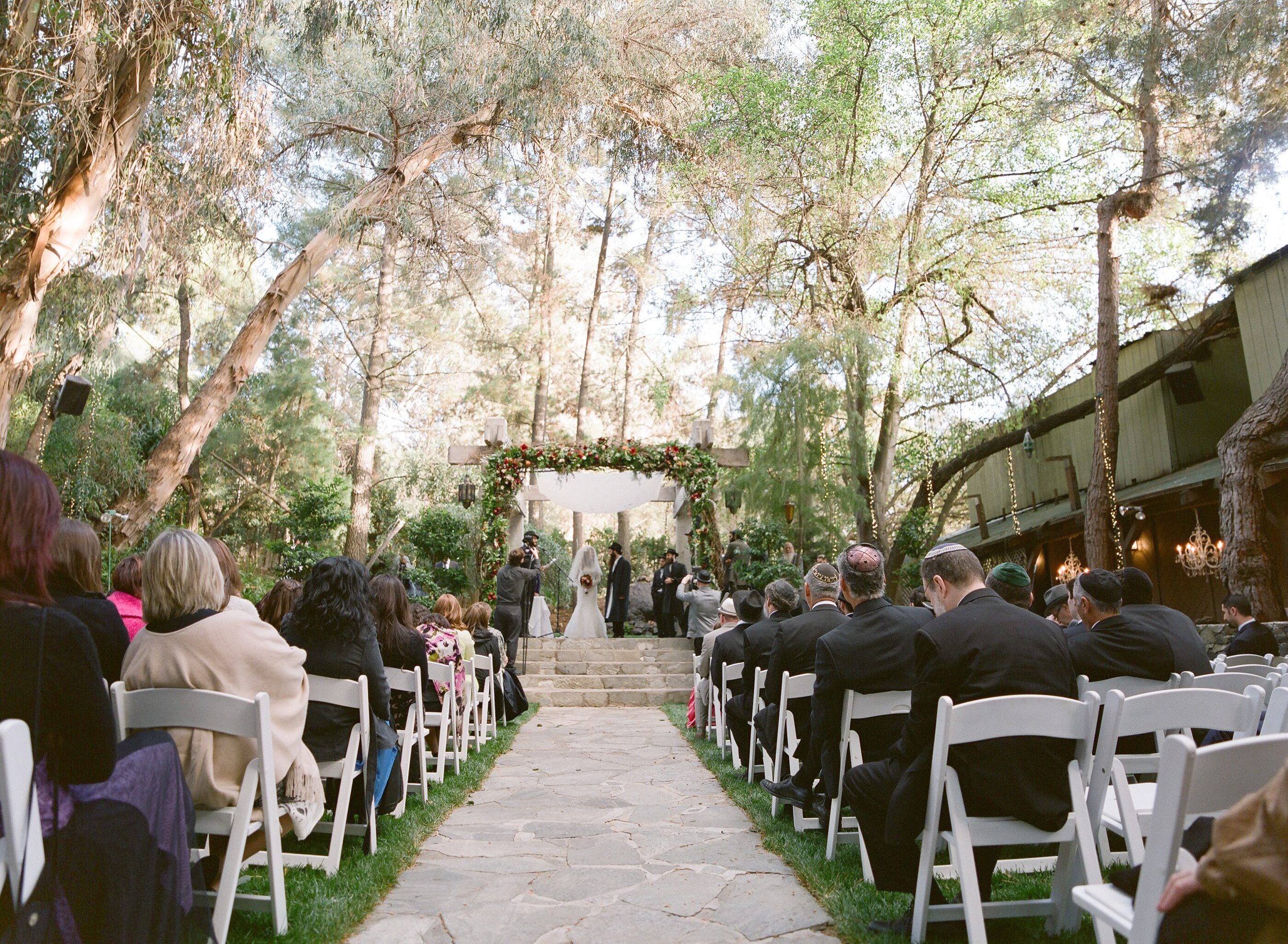 Top destination wedding photographer photographs Orthodox Jewish wedding at Calamigos Ranch California Wedding