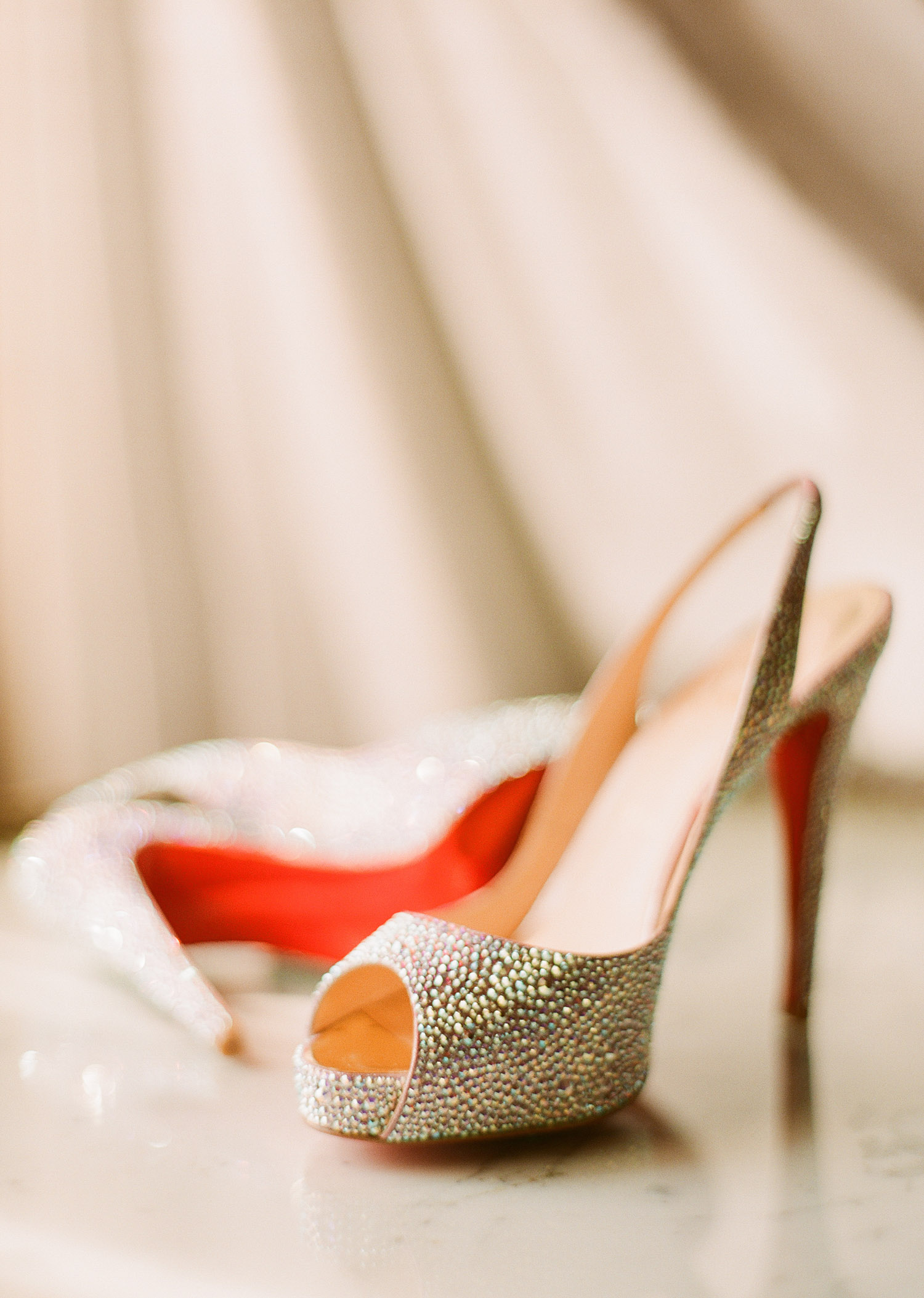 top destination wedding photographer photographs green bay packer Bryan Bulaga and abbie mumpower's wedding and her Christian Louboutin shoes for her wedding. 