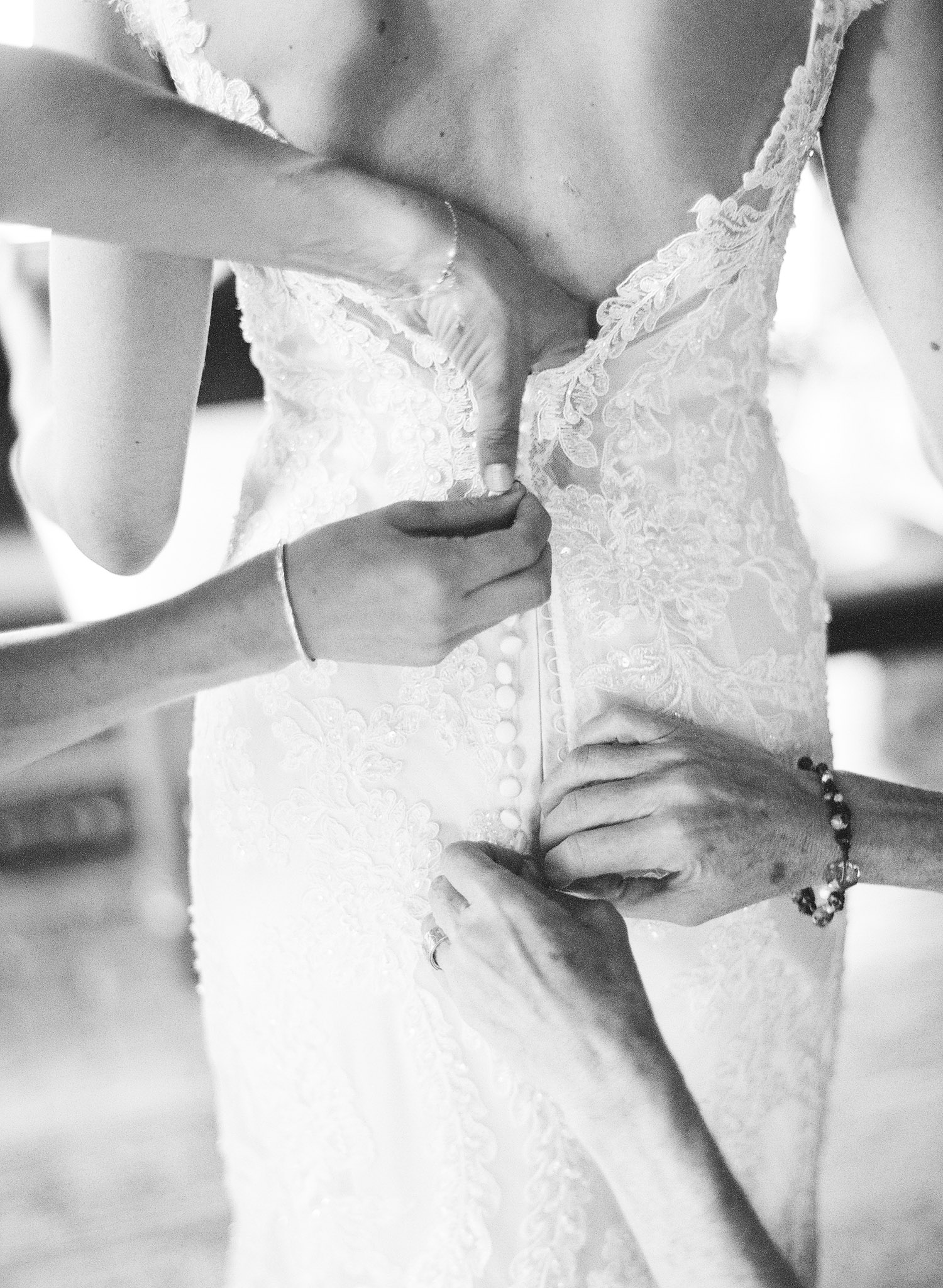 Bridesmaids button dress as destination wedding photographer Lexia Frank photographs this wedding on film at the Northwind Perennial Farm in Wisconsin www (dot) lexiafrank (dot com