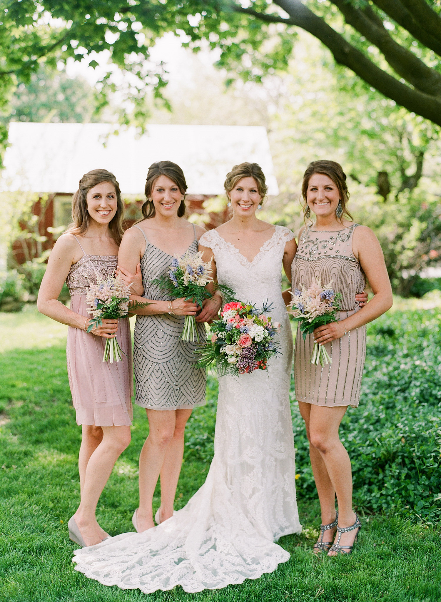 art deco nude bridesmaid dresses look great on the bridesmaids at this springtime wedding at Northwind Perennial Gardens - a beautiful wisconsin wedding venues - while Destination Wedding photographer Lexia Frank photographs this wedding on film 