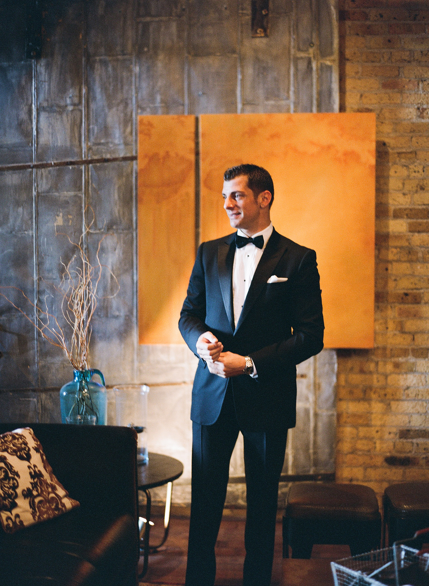 the groom gets ready at this Italian Villa wedding at the Villa Terrace wedding photographed by Destination wedding photographer Lexia Frank who is a film photographer for weddings internationally