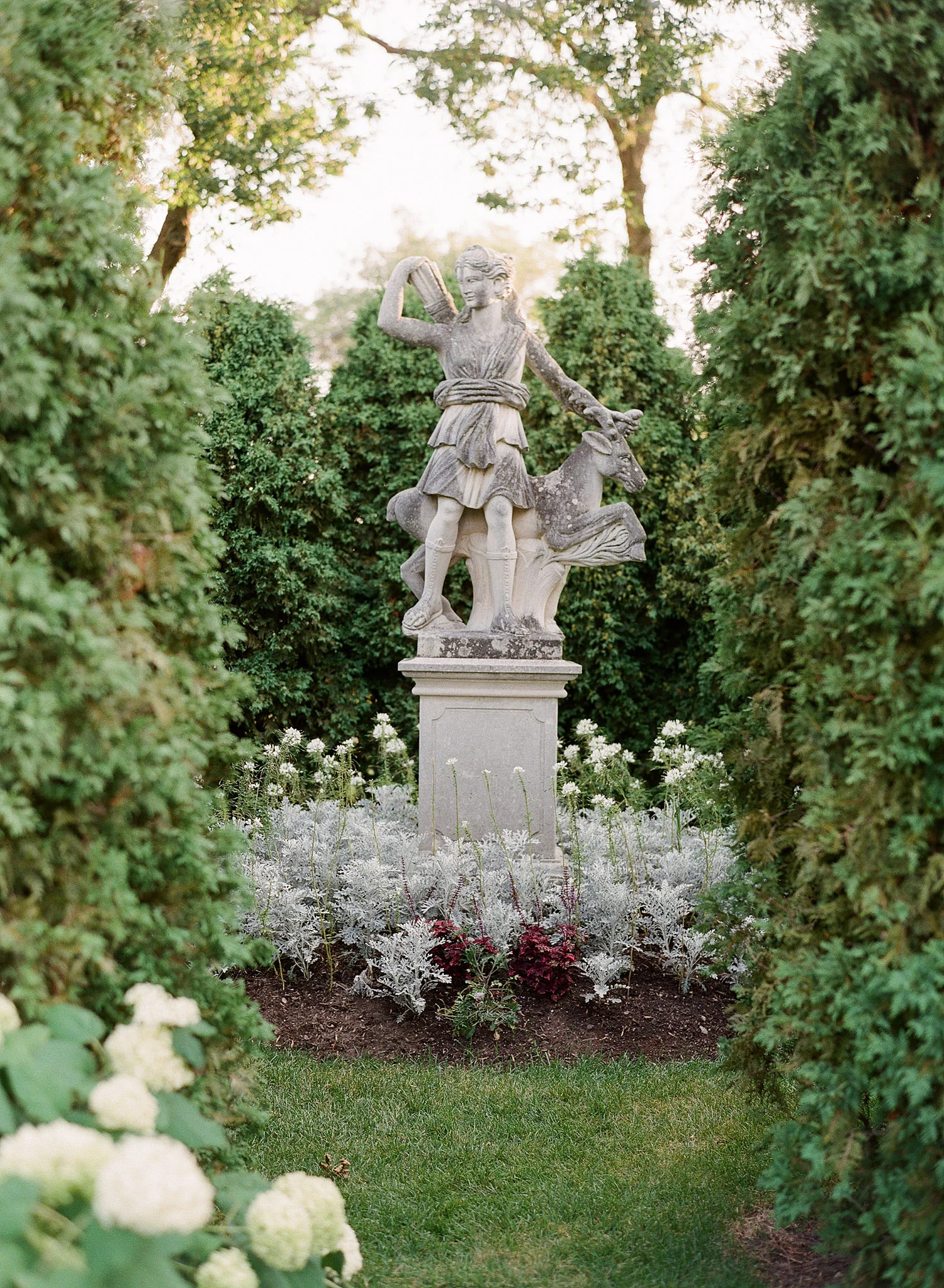 the gardens are beautiful for a wedding at the Villa Terrace, an italian villa where Destination wedding photographer, lexia frank, loves to shoot film for weddings