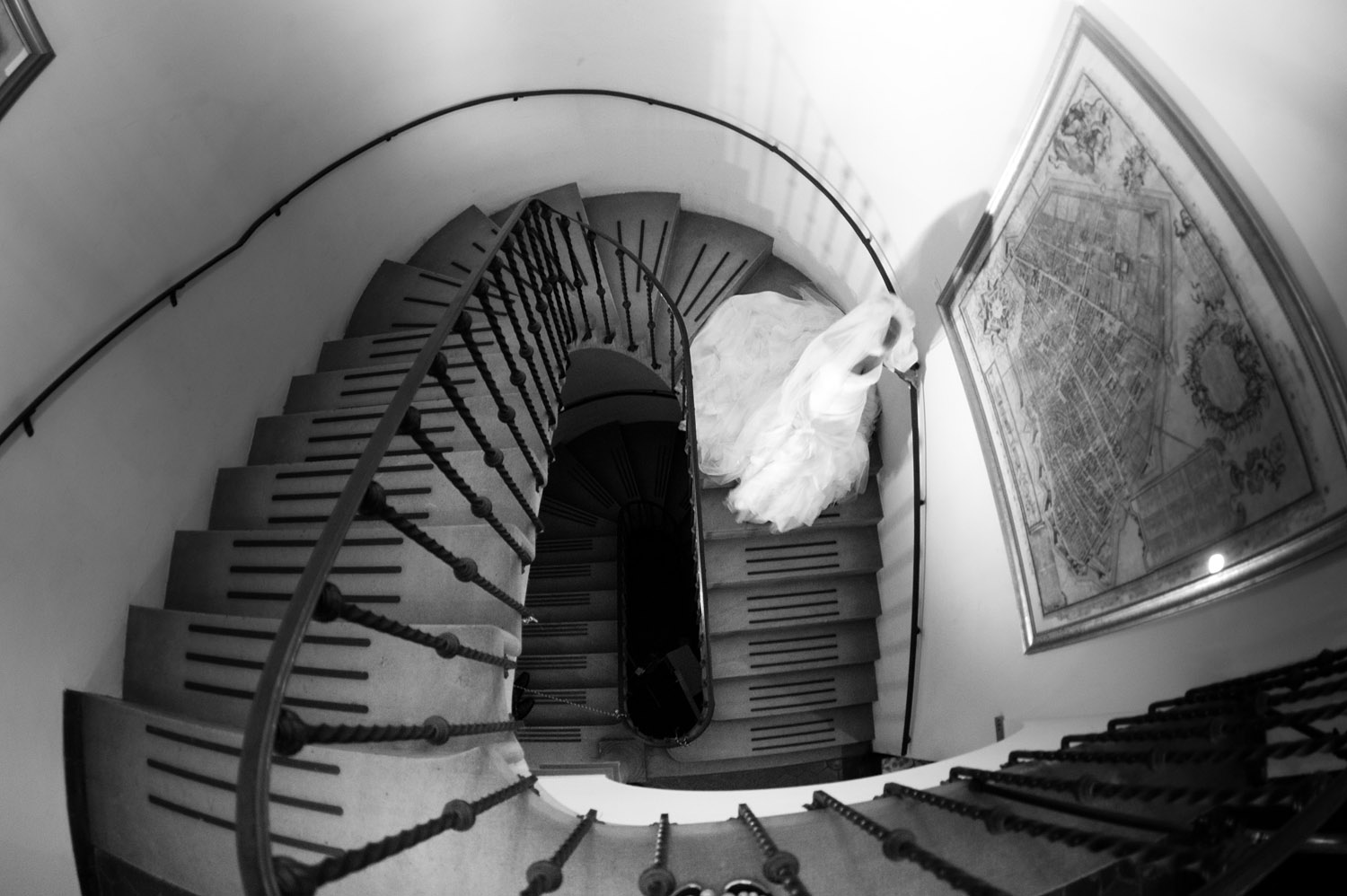 the bride walks down the staircase at the Villa Terrace- an italian villa that is a favorite wedding venue of Destination WEdding Photographer, Lexia Frank, who is a film photographer for weddings