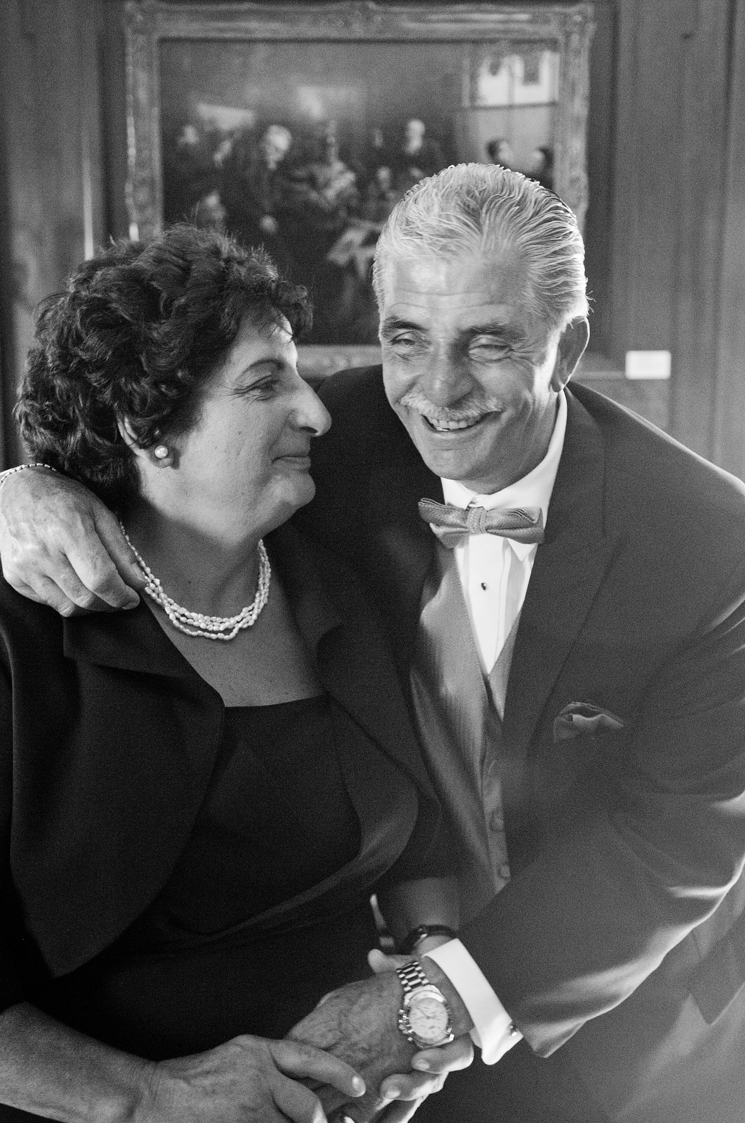 Italian Parents of the bride pose together at this Italian Destination Wedding at the Villa Terrace photographed by International destination wedding photogapher, Lexia Frank, who is a film photographer for luxury weddings