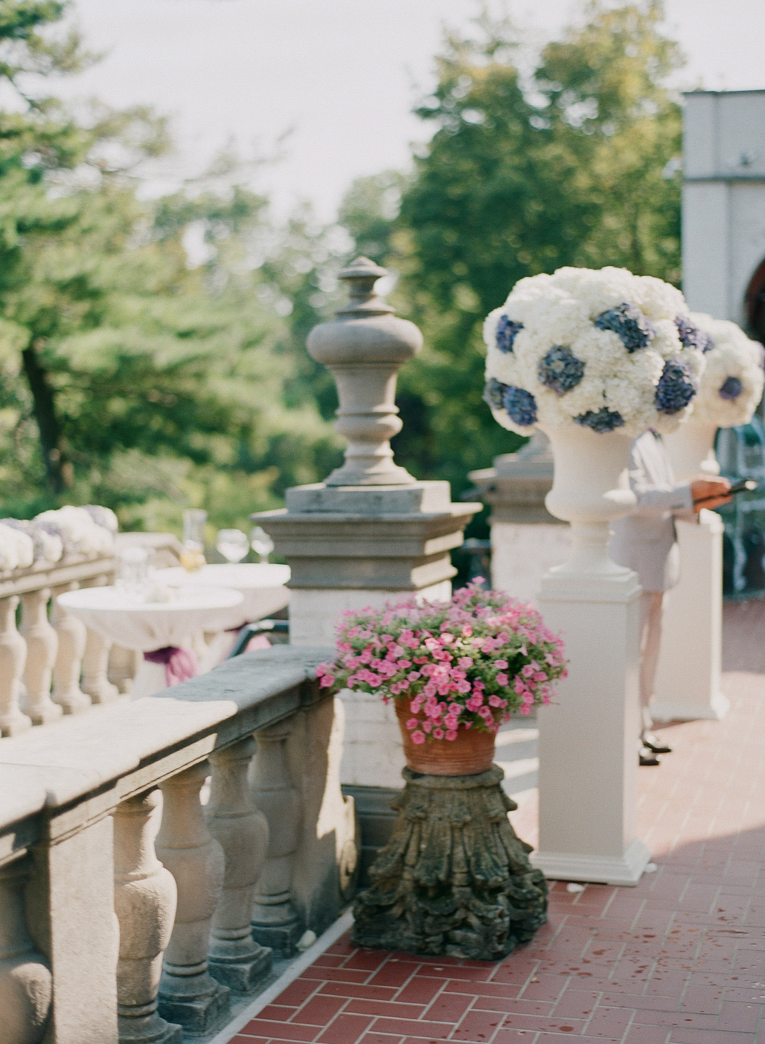 floral arrangements of vintage purple hydrangeas at the Italian Destination Wedding at the Villa Terrace - a favorite wedding venue of international wedding photographer, Lexia Frank, who is a film photographer for luxury weddings worldwide. 
