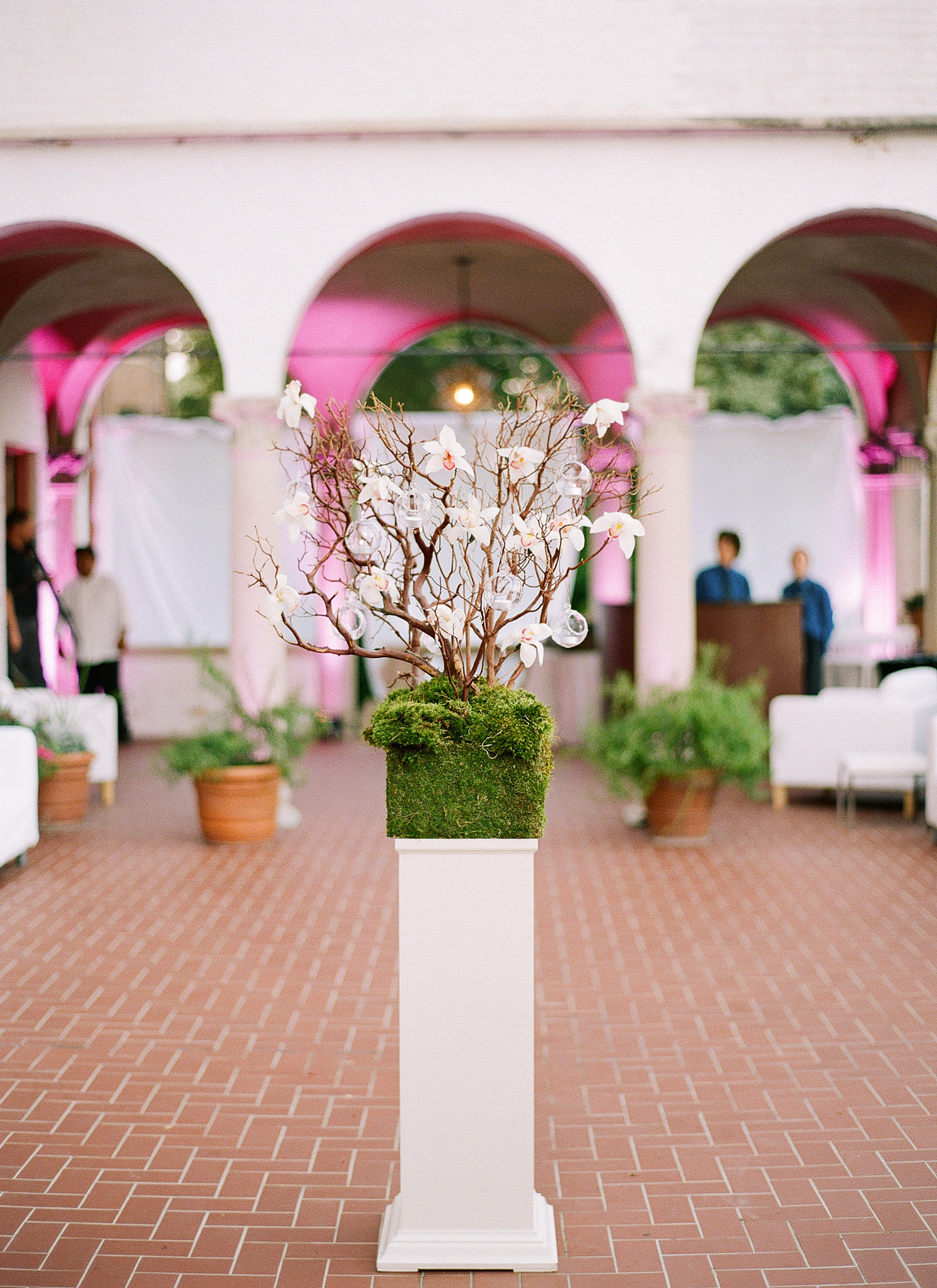 moss floral arrangements at the Italian Destination Wedding at the Villa Terrace - a favorite wedding venue of Destination wedding photographer, lexia frank, who is a film photographer for luxury weddings