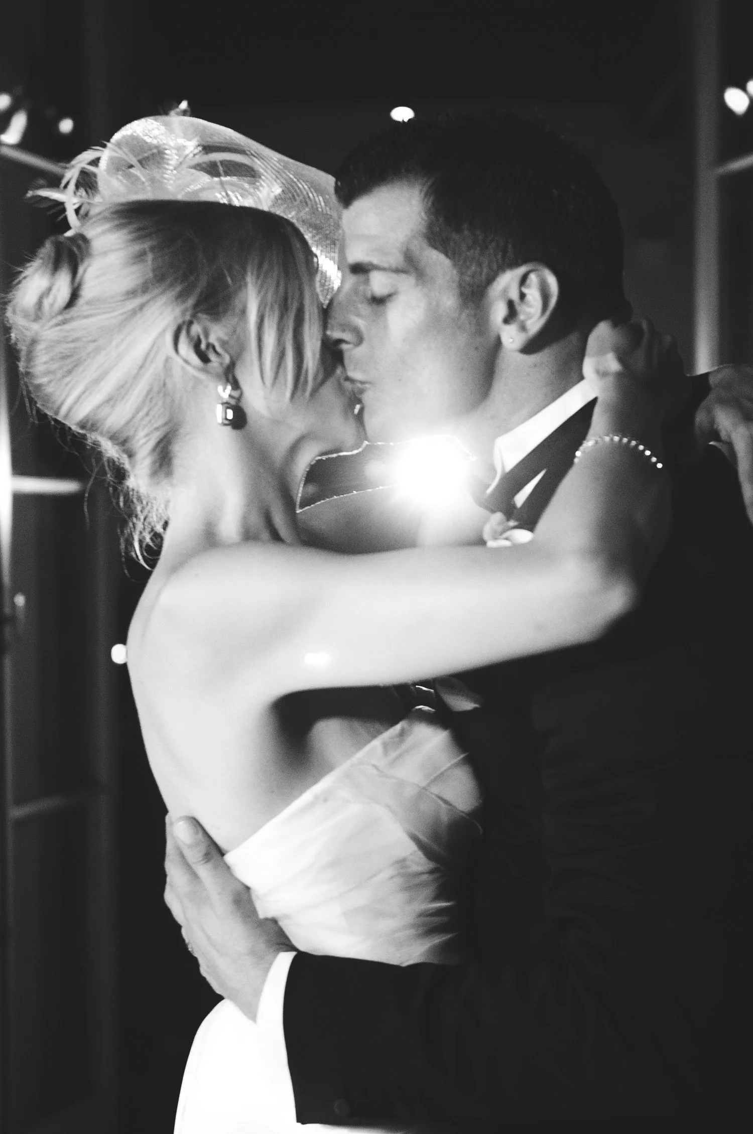 bride and groom share a first dance at the italian villa wedding venue The Villa Terrace while Destination wedding photographer Lexia Frank photographs the wedding on film 