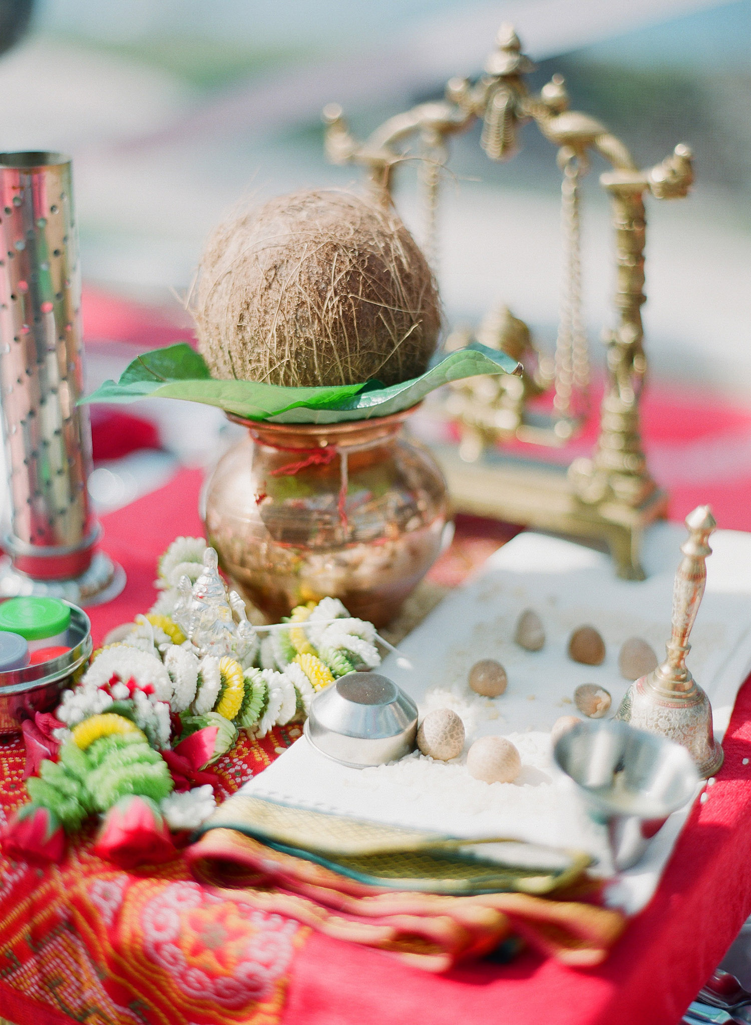 hindu ceremony items for the pithi ceremony at this indian wedding in Palm Coast Florida at the hammock beach resort planned by Reveology Events and photographed by Destination Wedding Photographer Lexia Frank, a top indian wedding photographer who photographs indian weddings on film, a film photographer for indian weddings, shooting luxury indian weddings in florida and worldwide 